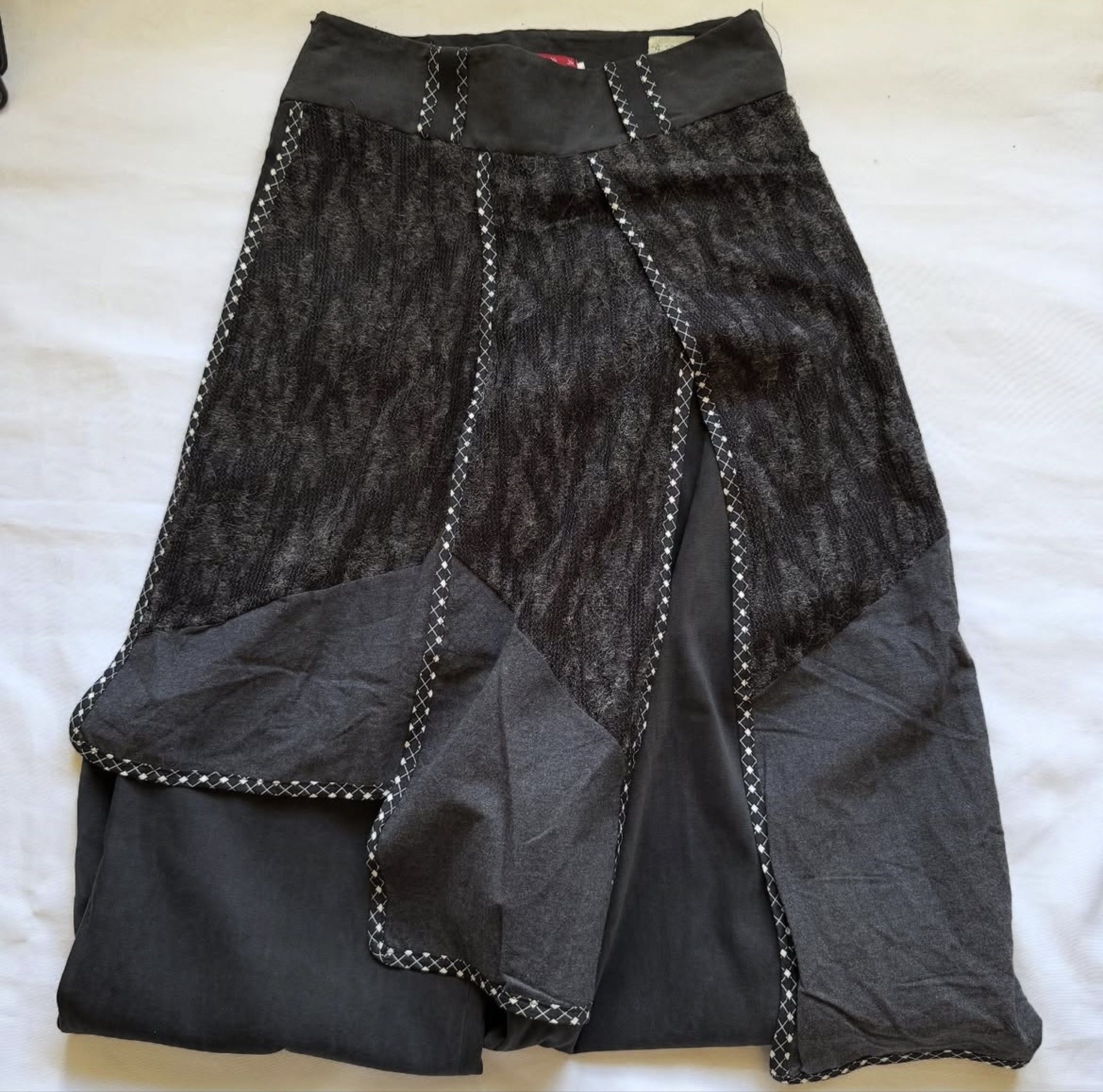 Unique Grey Layered Pants with Skirt Overlay (Category: Other Bottoms) located in Manila. Submitted by milkteeth (Listing ID 1417807631, Image 2). Description: • textured skirt pattern • wide leg cut • never worn measurements: waist - 30” length - 38-39” PS. photos are from the shop i bought it from.