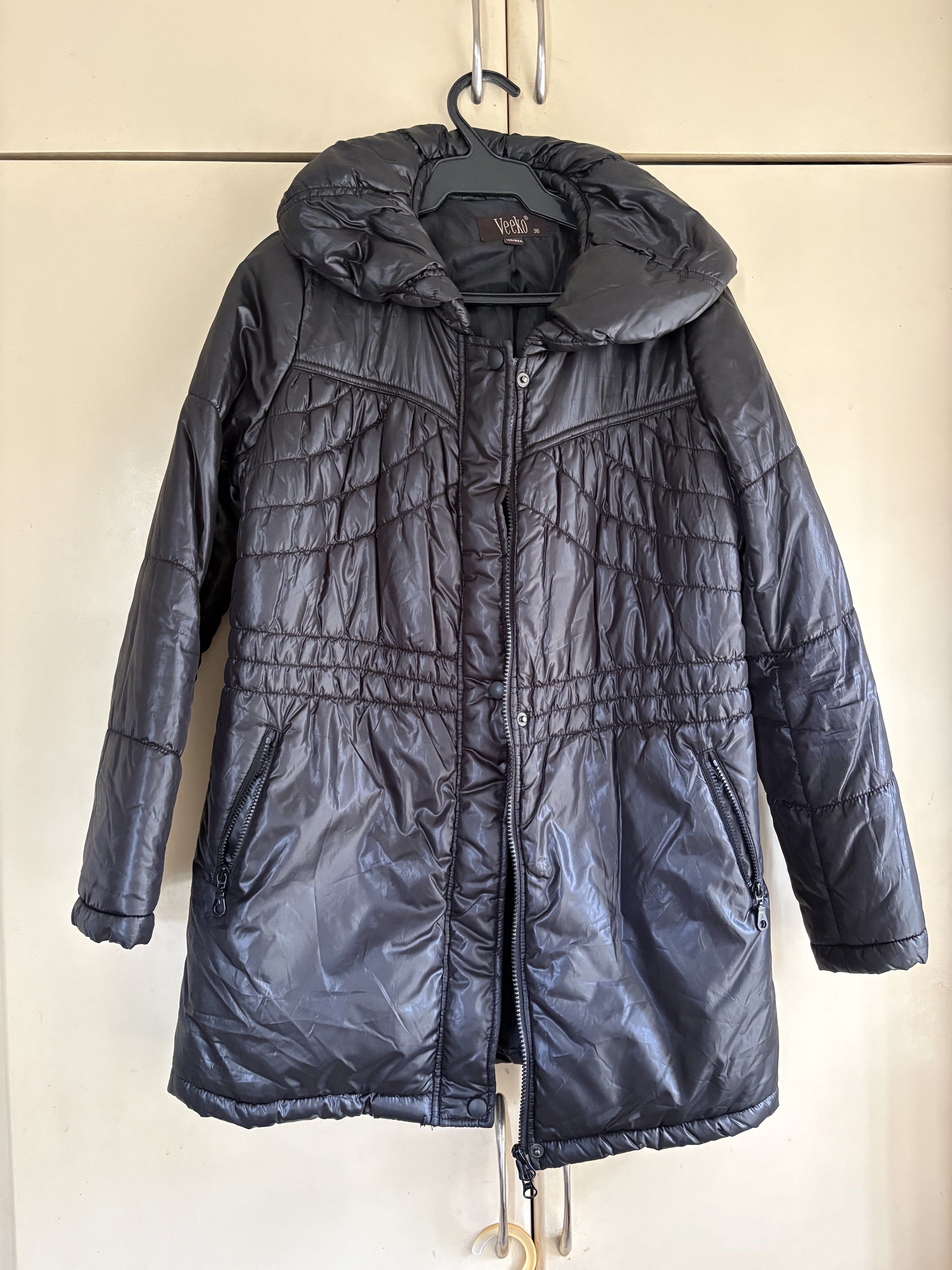 Veeko black down puffer jacket (trench coat-length) (Category: Coats, Jackets and Outerwear) located in Taguig. Submitted by aliuy (Listing ID 1417767122, Image 1). Description: - Needs washing, stored for too long - Measurements in photos, no when worn photos ▪️Shipping via J&T or Grab Express/Lalamove for MNL area; J&T for provinces ▪️No Shope.e checkout ▪️Location of item: Batangas City ▪️ Will hold reserved items for 2 days upon acceptance of