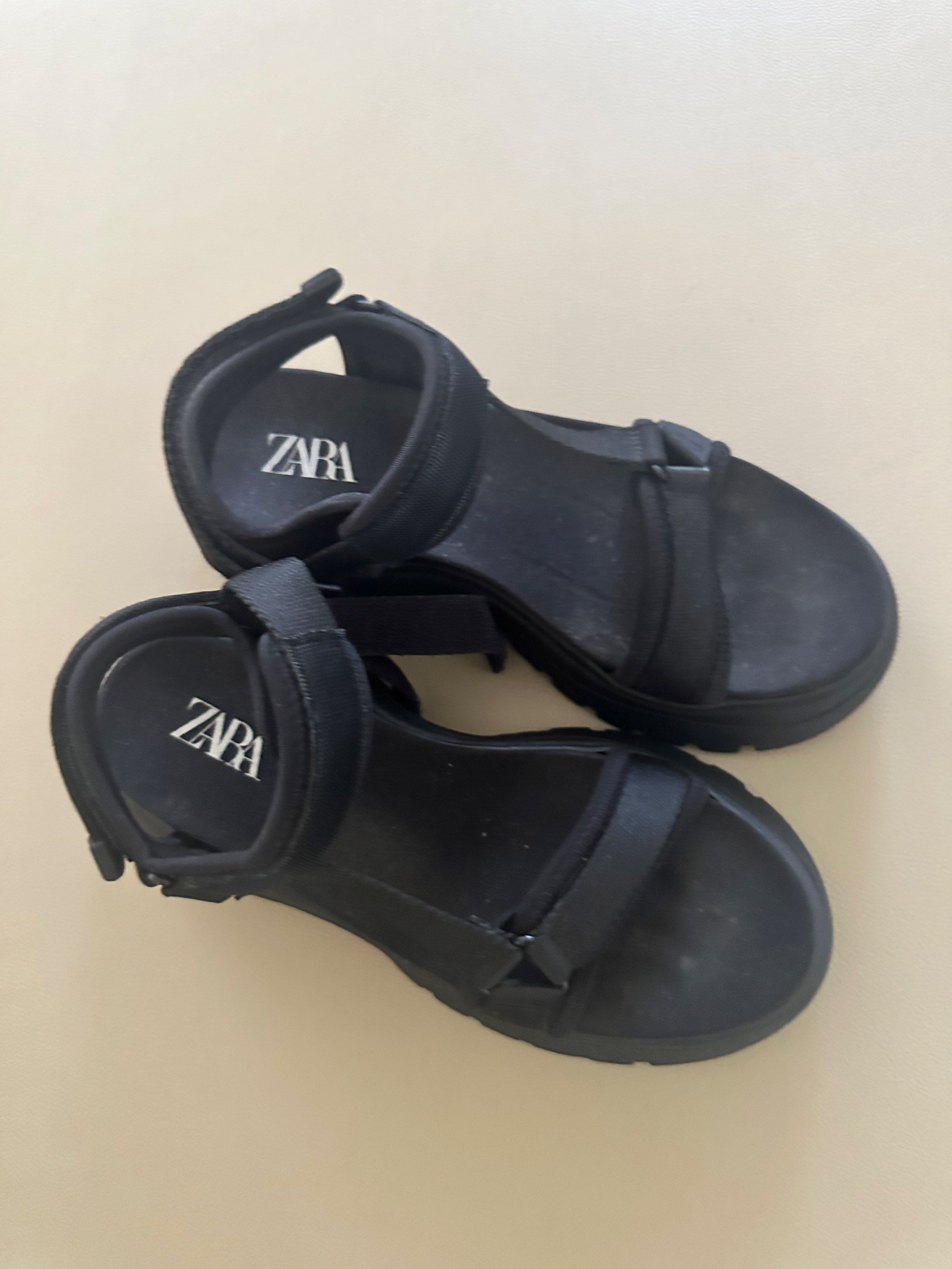 Zara Platform Sandals size 37 (Category: Sandals) located in Muntinlupa City. Submitted by DeclutterShop (Listing ID 1417686682, Image 1). Description: Zara Black Platform Sandals Lightly used.