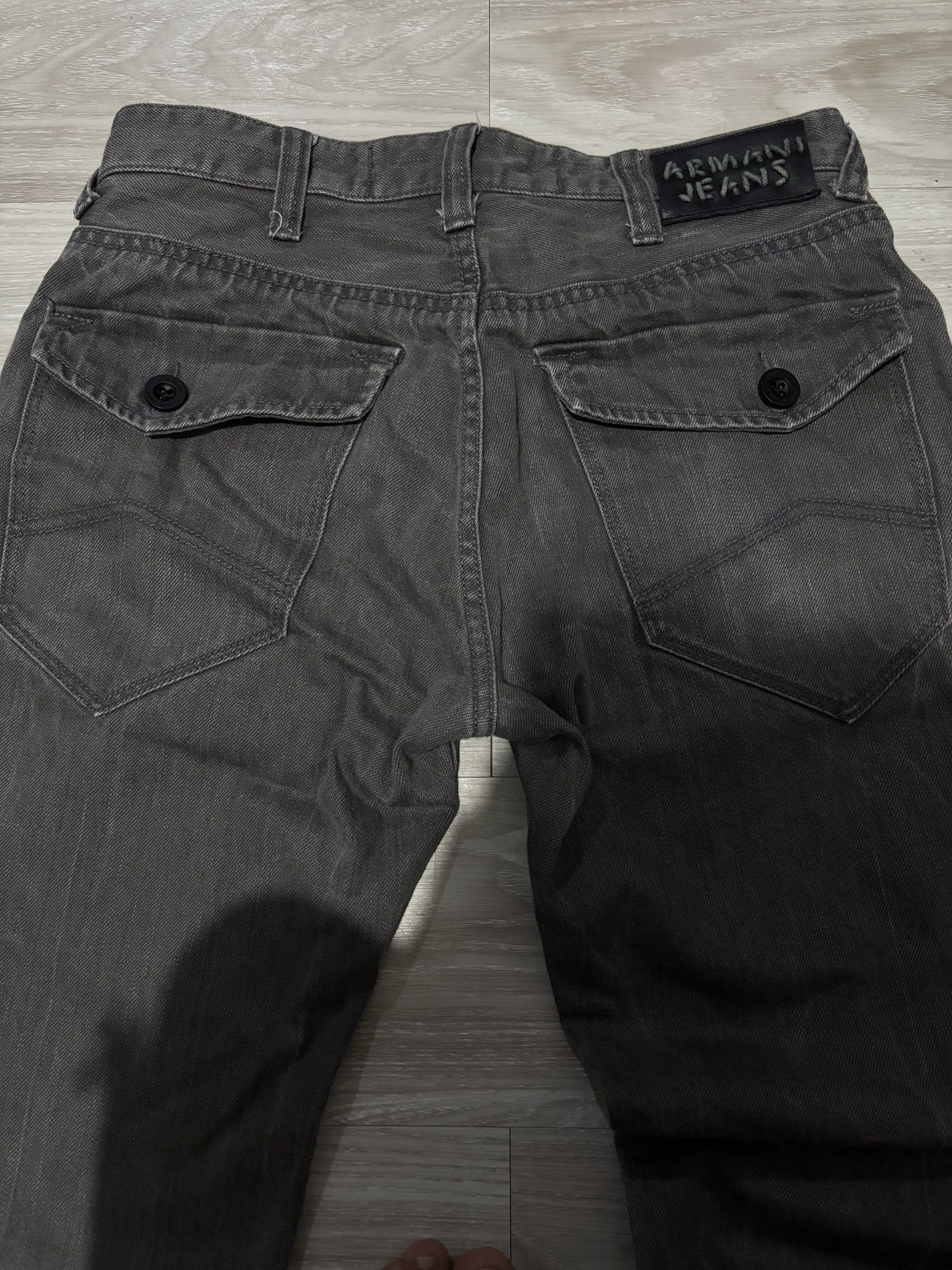 Armani Jeans Grey Denim Jeans (Category: Jeans) located in San Jose del Monte. Submitted by 50.50_split (Listing ID 1417872405, Image 3). Description: - Armani Jeans - Grey denim - Size: 30/28 - Straight leg cut - Button fly - Two front pockets - Two back pockets with button closure - Armani Jeans leather patch.