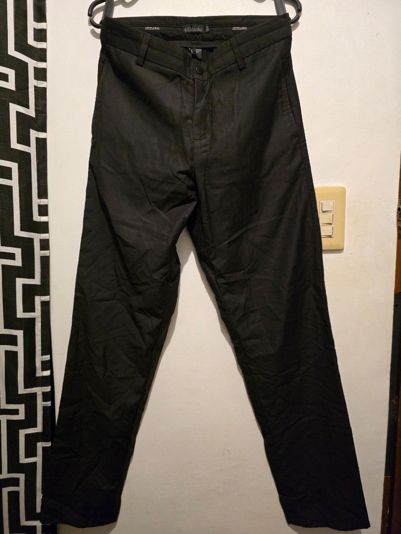 black "attitudes" brand trousers (Category: Trousers) located in Taguig. Submitted by bandsaccount (Listing ID 1417924975, Image 2). Description: black "attitudes" brand trousers. - I didn’t get to use this much since our office dress code is casual. I think I only used this two/three times before - Size: 29 - Unisex - Classic design - Button closure - Durable material - Versatile for everyday wear.