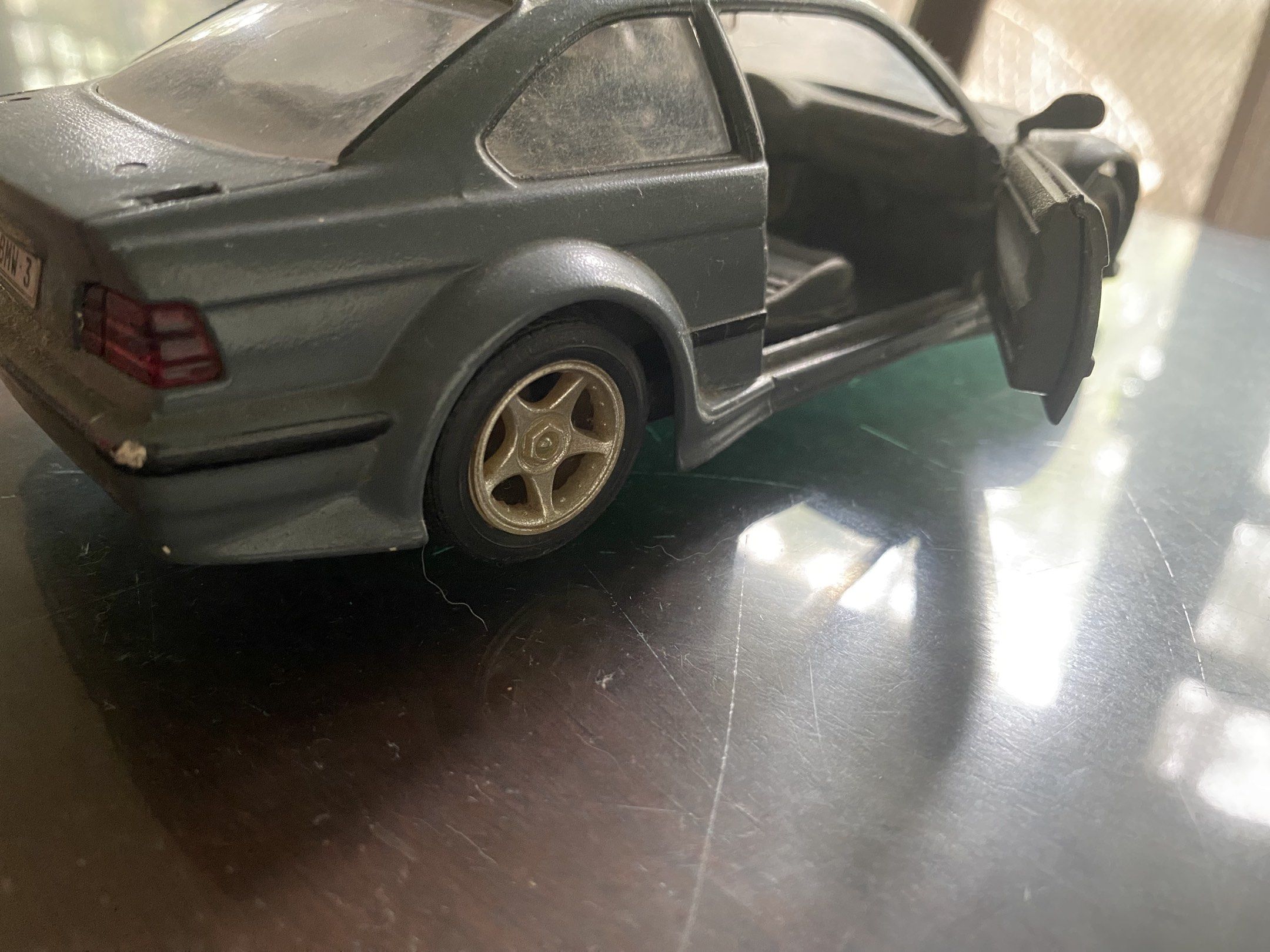 BMW M3 model (Category: Vehicle & Diecast Models) located in Pasig City. Submitted by ecochicsales (Listing ID 1417926336, Image 3). Description: - BMW 1:24 scale -Burago Italy - Gray color - Doors open - Collectible item - Layered condition.