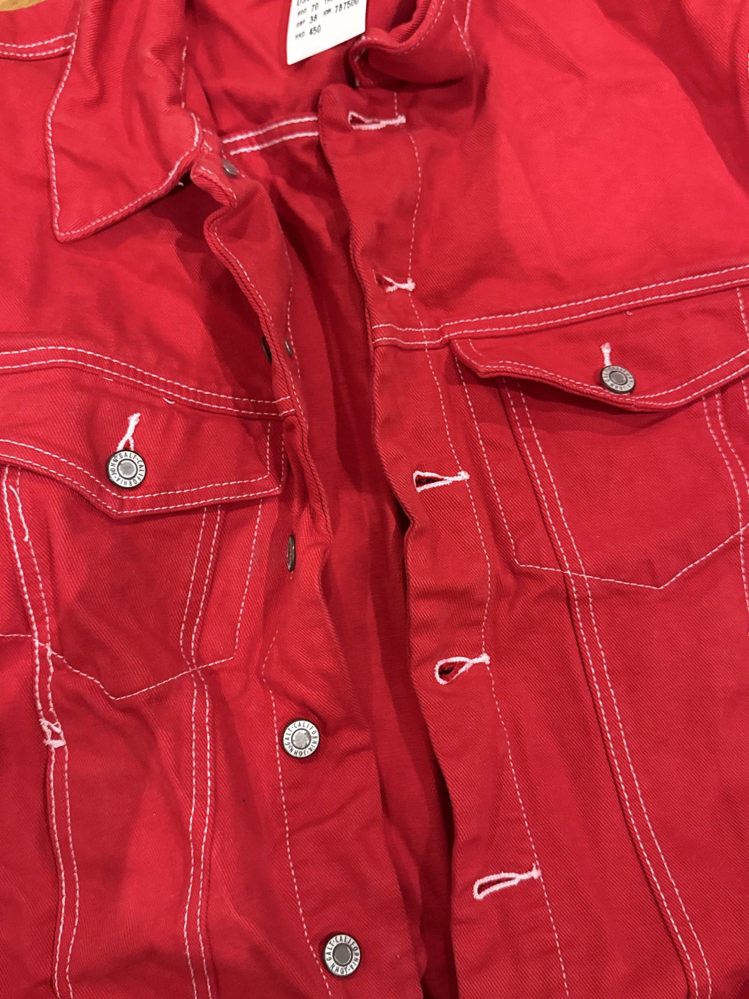 Brandy Melville Red Jacket (Category: Coats, Jackets and Outerwear) located in Manila. Submitted by eb.declutters (Listing ID 1417957560, Image 3). Description: - Brandy Melville red jacket - Button-up front - Two chest pockets - White stitching details - Collared neckline - Long sleeves - Original price tag with USD, CAD, GBP, THB, IDR, and HKD prices.