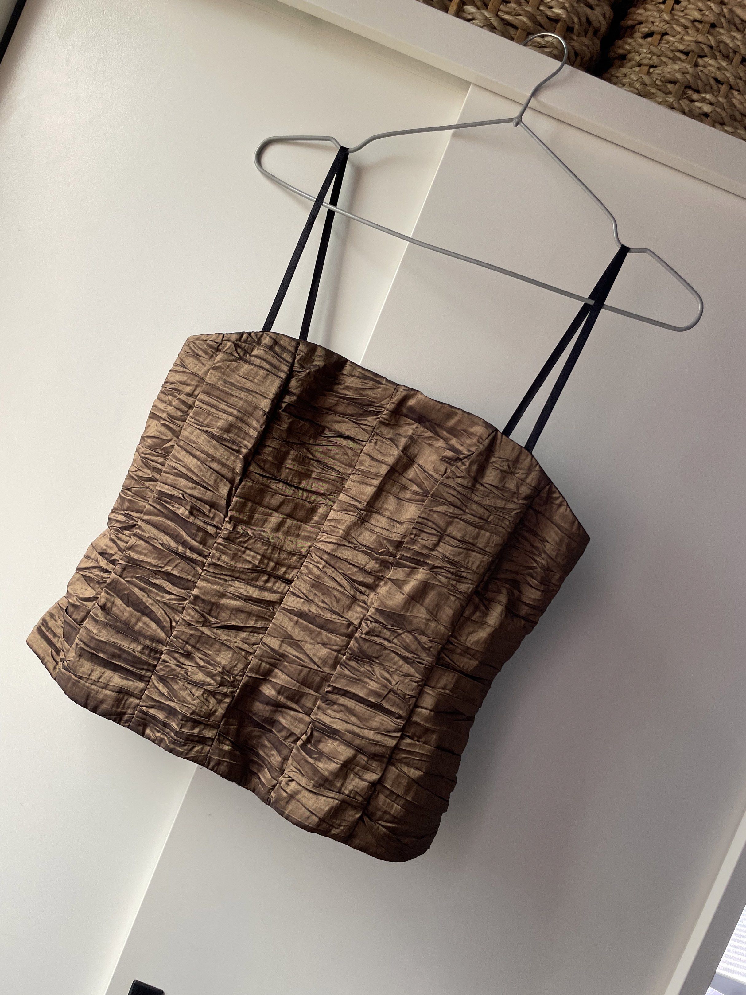 Brown Ruched Corset Tube (Category: Blouses) located in Manila. Submitted by chenpots (Listing ID 1417960464, Image 1). Description: - Brown ruched corset - Size S-M - Fitted silhouette - Back zipper closure - Textured fabric - Subtle sheen brown Napakaganda sa personal! Tube top lang po ito. Yung straps ay para sa sampay..