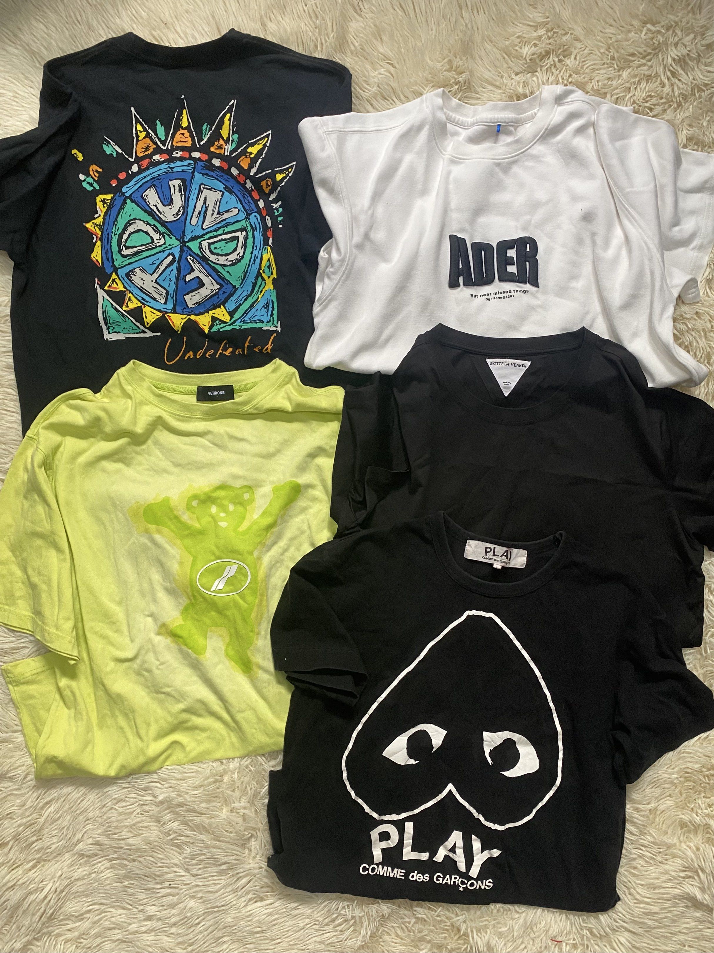 Bundle tees for 1500 undftd, welldone, play cdg, ader (Category: Tshirts & Polo Shirts ) located in Manila. Submitted by switchcity (Listing ID 1417828830, Image 1). Description: All are medium-large frame Pwede resell, pwede panggamit Shipping is on you.