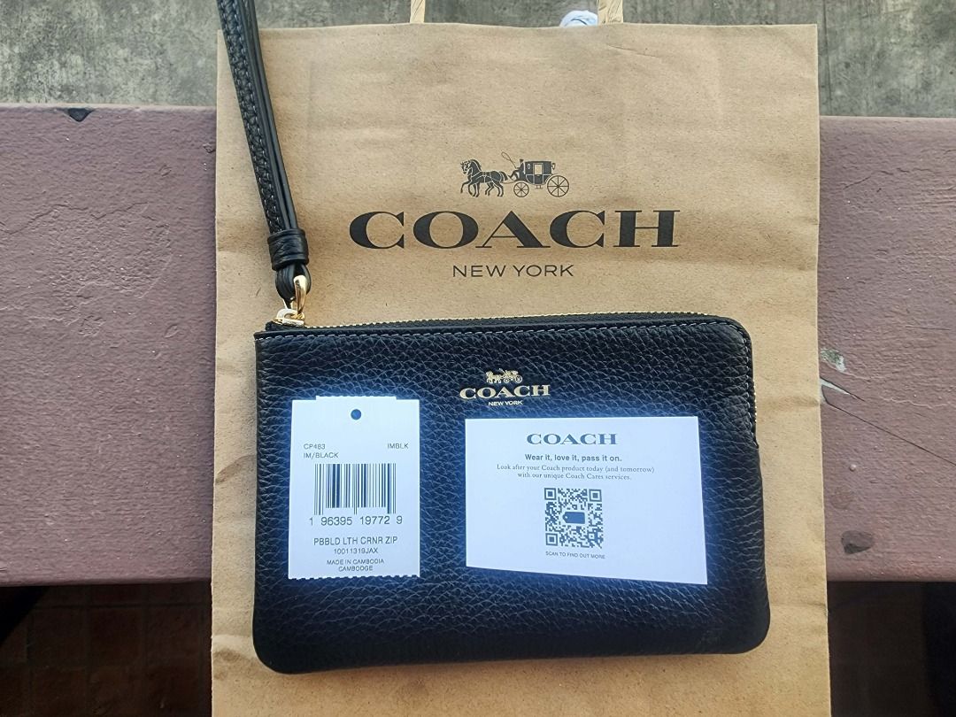 Coach Corner Zip Wristlet Vegan Leather (Category: Luxury Bags & Wallets) located in Pasay City. Submitted by juno_raph (Listing ID 1417937315, Image 3). Description: - Authentic Coach wristlet - Color: Black - Includes original Coach paper bag and tags - Pebbled leather texture - Vegan Leather - RFS: Extra - Brand new from US; never used - Negotiable .