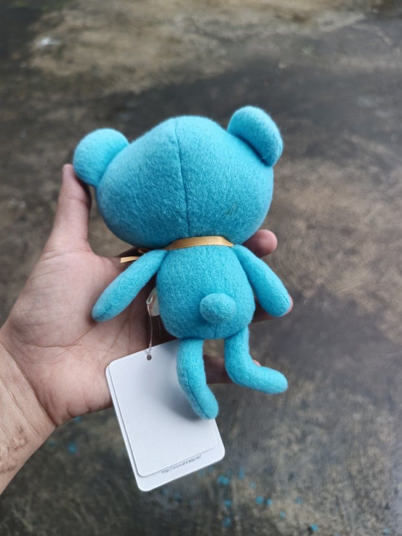 Colorful Bear Plush Toy shinada (Category: Plushies & Soft Toys) located in Daet. Submitted by heracaramel (Listing ID 1417931733, Image 2). Description: - Adorable bear plush toy - Features a teal body with brown accents - Includes a small yellow ribbon - Comes with original tag - Perfect for collectors or gifts.