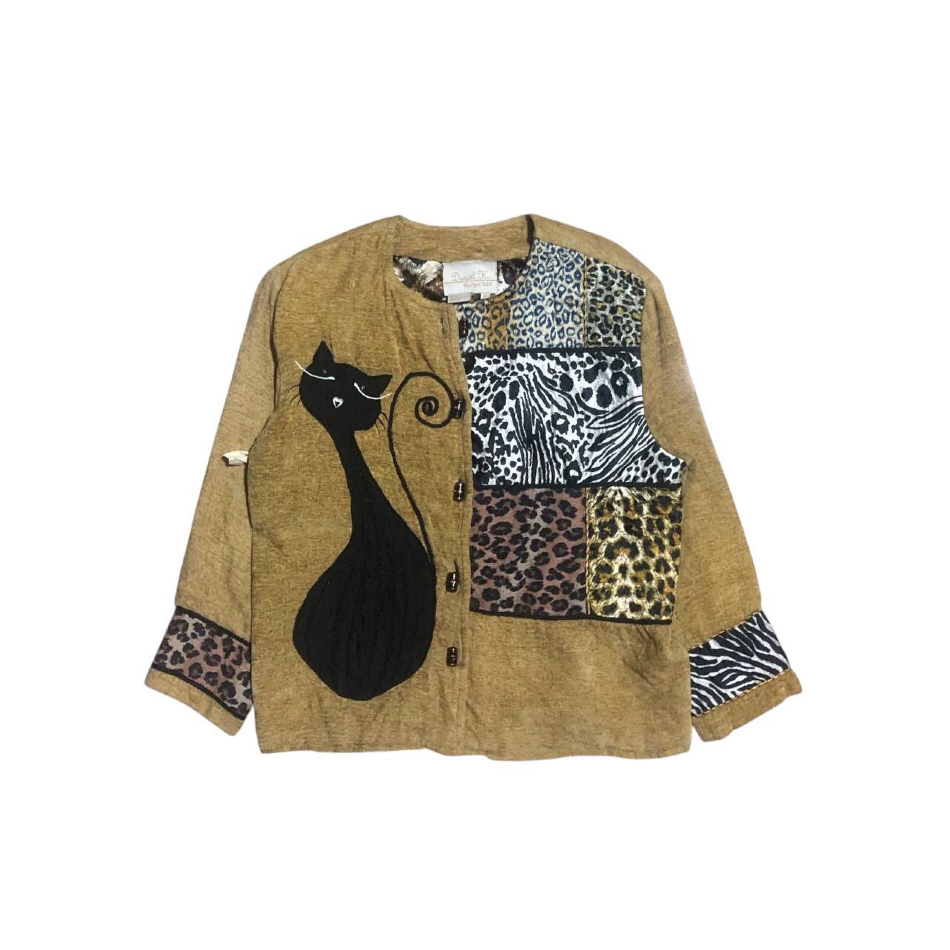 DANIEL K VINTAGE CARDIGAN ANIMAL PRINT PATCHWORK (Category: Coats, Jackets and Outerwear) located in Manila. Submitted by grailledrags (Listing ID 1417966425, Image 1). Description: DANIEL K VINTAGE CARDIGAN ANIMAL PRINT PATCHWORK L23•W22 •PATCHWORK DESIGN •UNIQUE PIECE •STATEMENT JACKET •WITH LEOPARD LINING •THICK •NO ISSUE •NEED WASH 549 + sf.