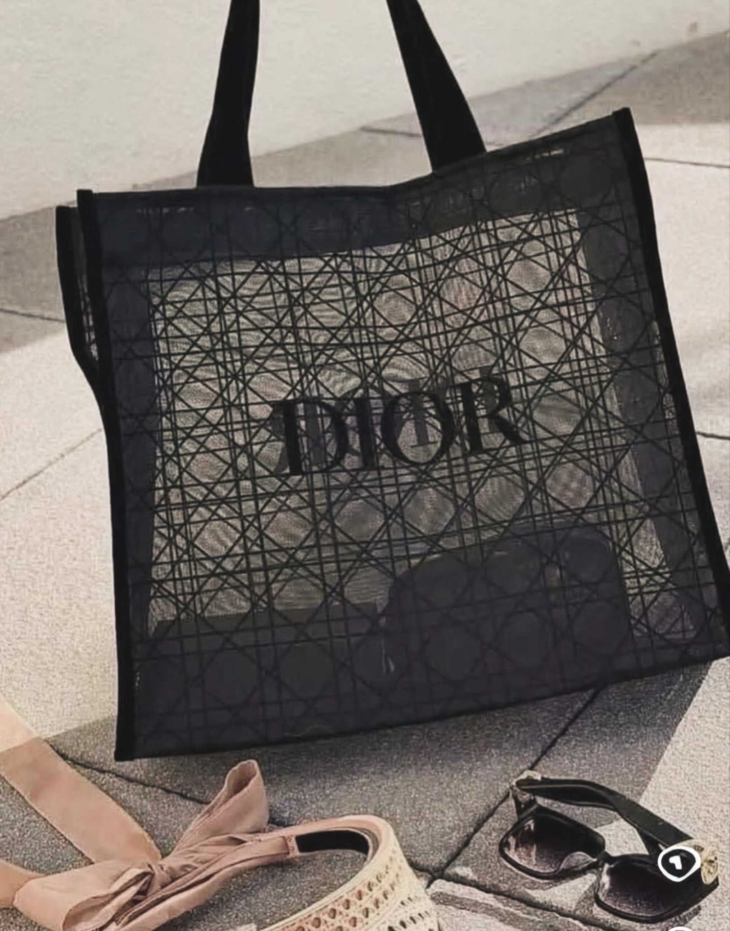 Vip Gift Dior Tote Bag (Category: Luxury Bags & Wallets) located in Imus. Submitted by diana2999 (Listing ID 1418001905, Image 2). Description: - Brand new Dior tote bag - Black color - Woven design with Dior logo - Features black handles - Perfect for everyday use - Chic and versatile.