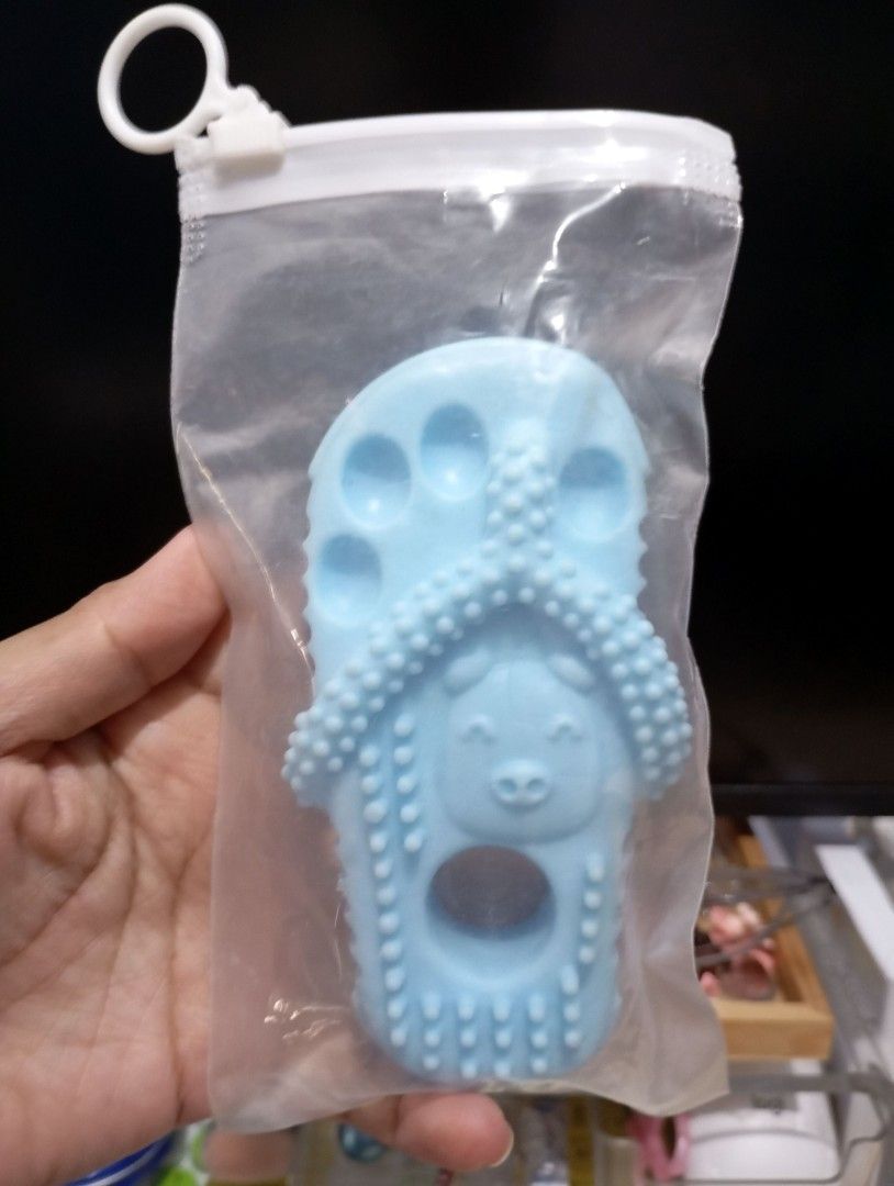 Dogs Slipper Teether Chew Toy (Category: Soothers & Pacifiers) located in Quezon City. Submitted by ana-chan (Listing ID 1417915353, Image 1). Description: Baby sandal teether in soft blue. Textured surface for gum soothing. Easy grip design. Comes in a clear, zip-lock bag..