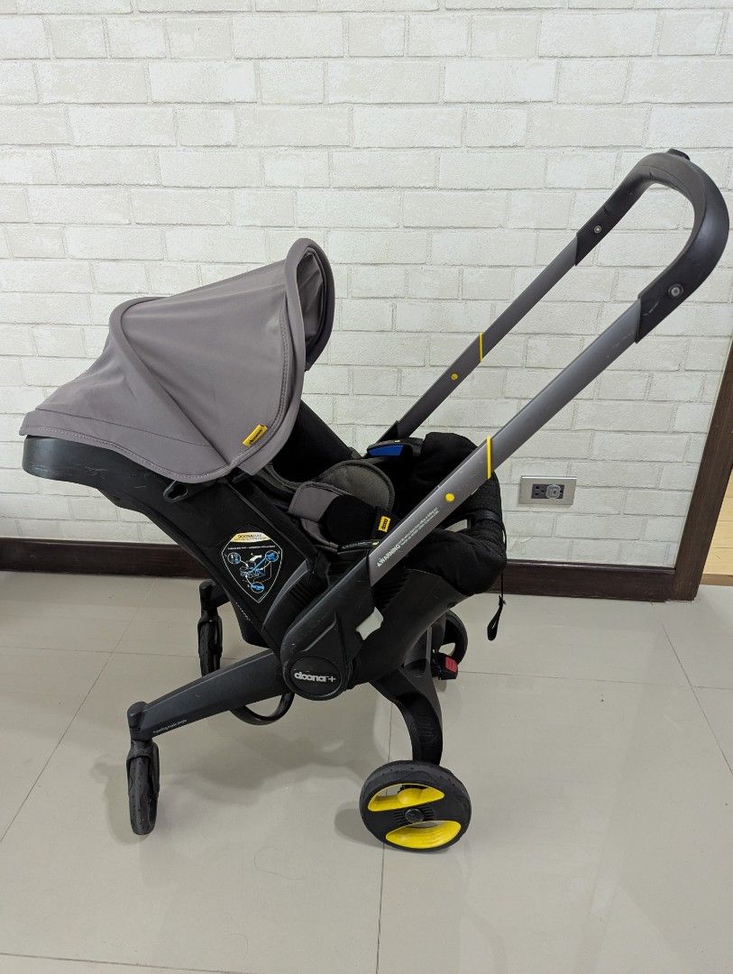 Doona stroller + car seat (Category: Strollers) located in Manila. Submitted by mbqueenofthestars (Listing ID 1418009744, Image 1). Description: lightly used doona stroller and carseat no damage includes rain cover and vehicle protector.