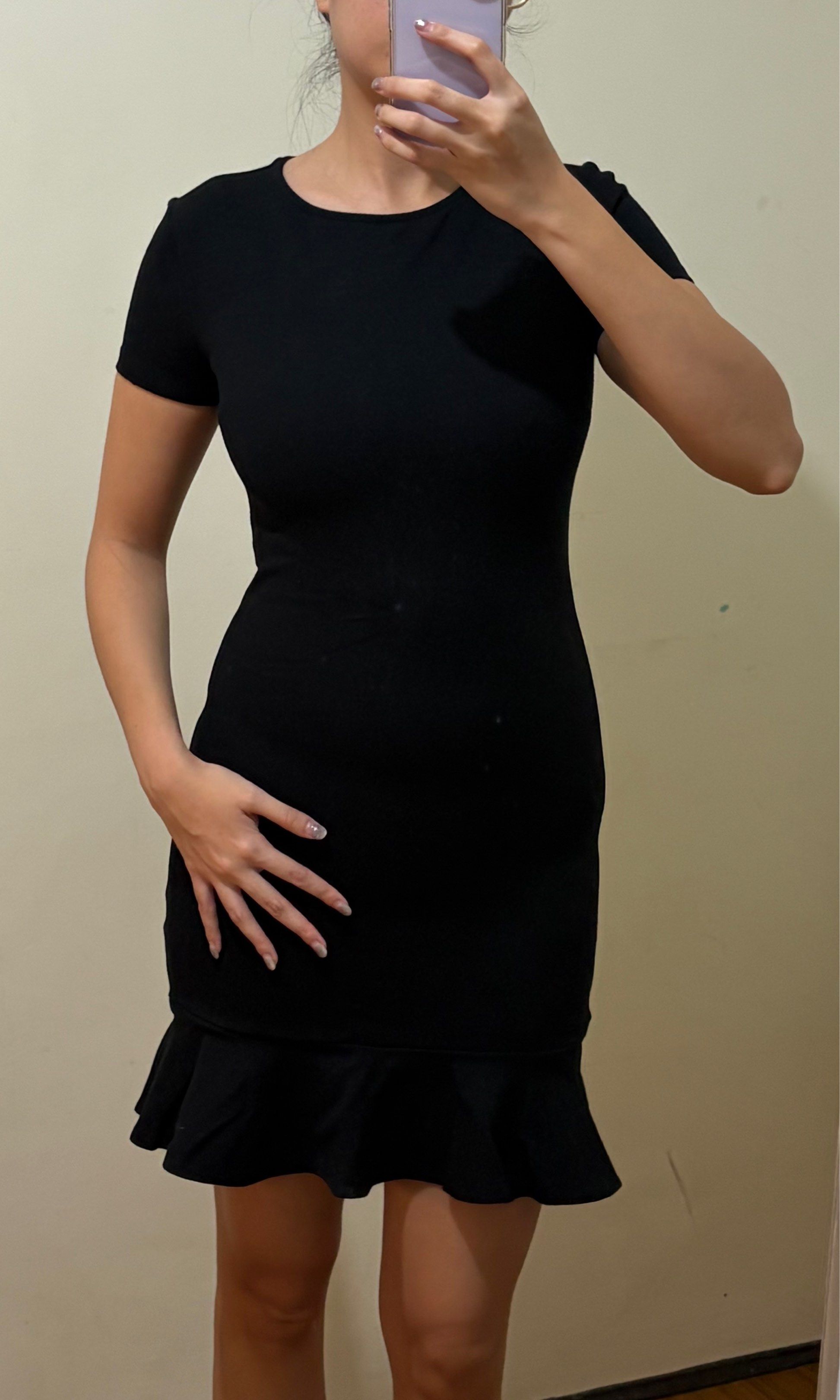 Forever 21 Black Ruffle Hem Dress (Category: Dresses) located in Makati City. Submitted by thewe_ph (Listing ID 1417881536, Image 2). Description: - Forever 21 black dress - Round neckline - Short sleeves - Fitted silhouette - Ruffle hem - Back zipper closure - Versatile for various occasions DM me for inquiries.