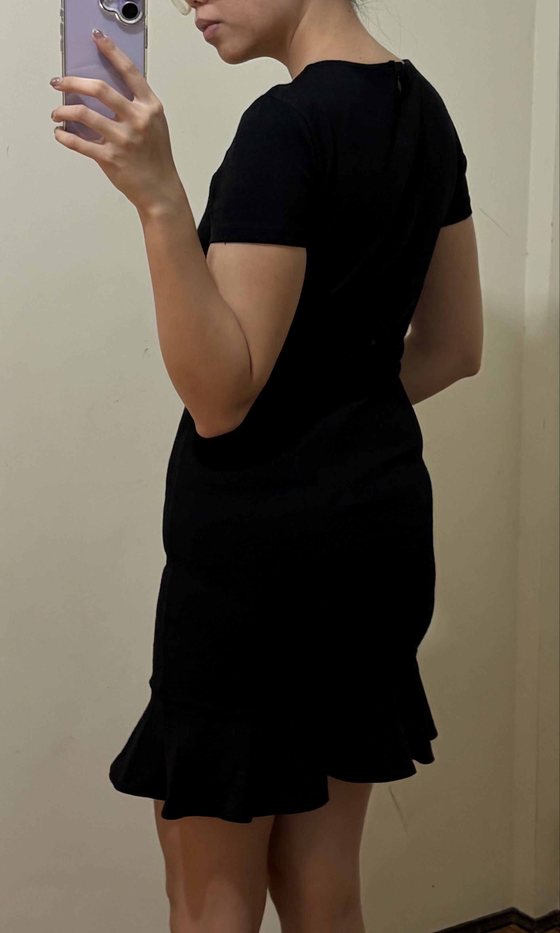 Forever 21 Black Ruffle Hem Dress (Category: Dresses) located in Makati City. Submitted by thewe_ph (Listing ID 1417881536, Image 3). Description: - Forever 21 black dress - Round neckline - Short sleeves - Fitted silhouette - Ruffle hem - Back zipper closure - Versatile for various occasions DM me for inquiries.