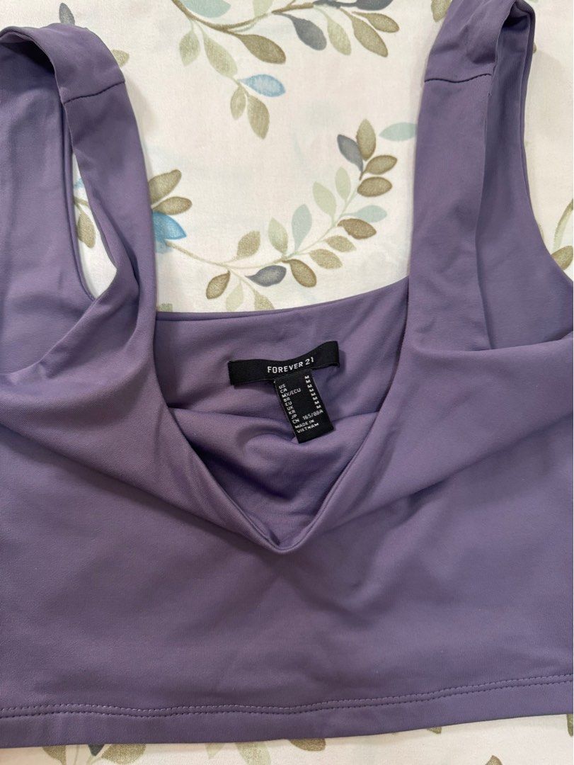 Forever 21 Purple Crop Tank Top (Category: Sleeveless) located in Antipolo. Submitted by nbrns (Listing ID 1417940448, Image 2). Description: - Forever 21 - Square neckline - Solid purple color - Fits small-medium - Pairs well with high-waisted bottoms.