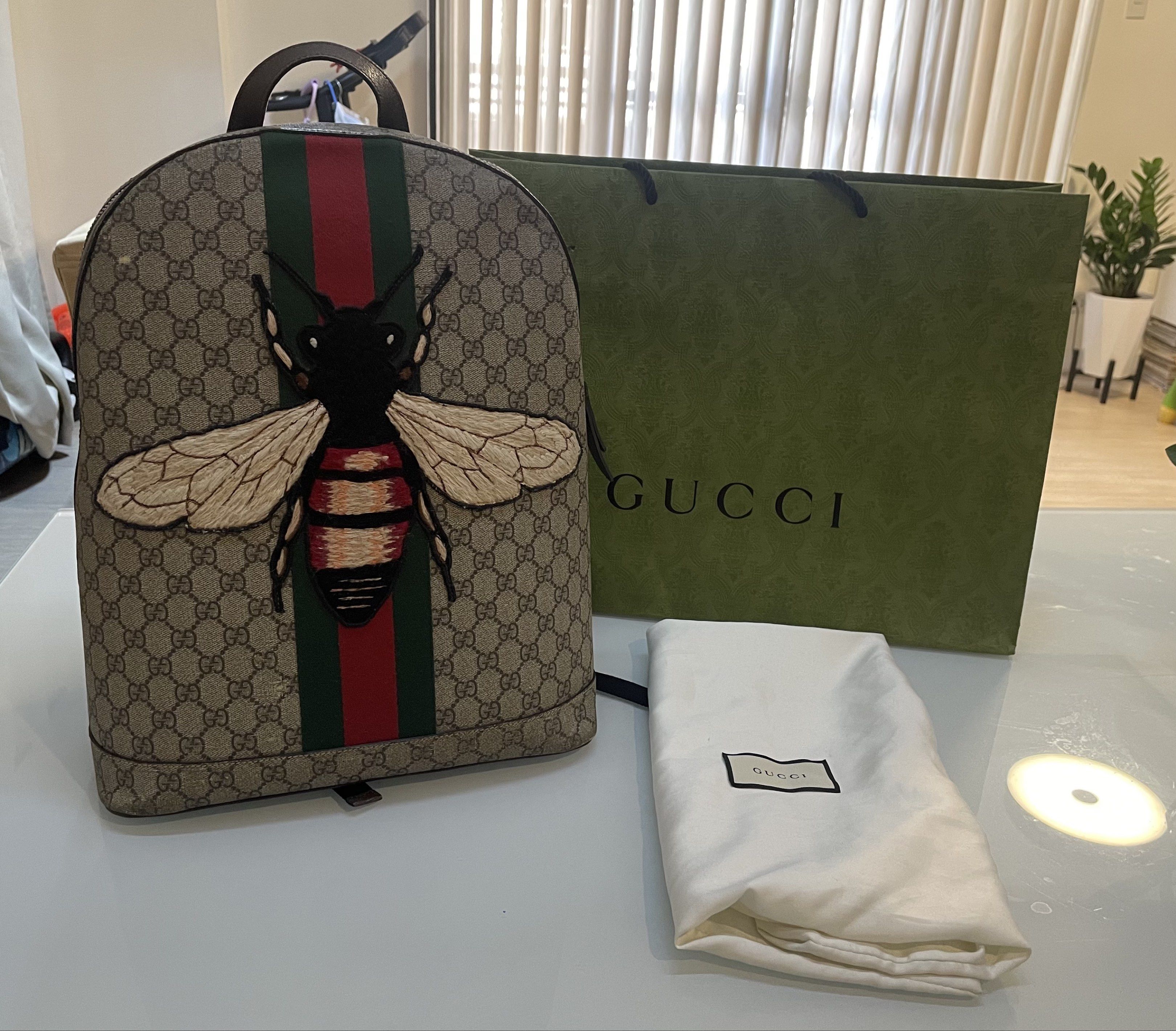Gucci GG Supreme Monogram Animalier Bee Dome Backpack (Category: Luxury Bags & Wallets) located in Taguig. Submitted by declutteringmom314 (Listing ID 1417863767, Image 3). Description: - Authentic Gucci backpack - Iconic GG Supreme monogram - Eye-catching bee applique - Classic web stripe detail - Convenient top handle - Secure zip closure - Spacious interior - Comfortable, padded straps - Includes dust bag and Gucci shopping bag,signs of usage.