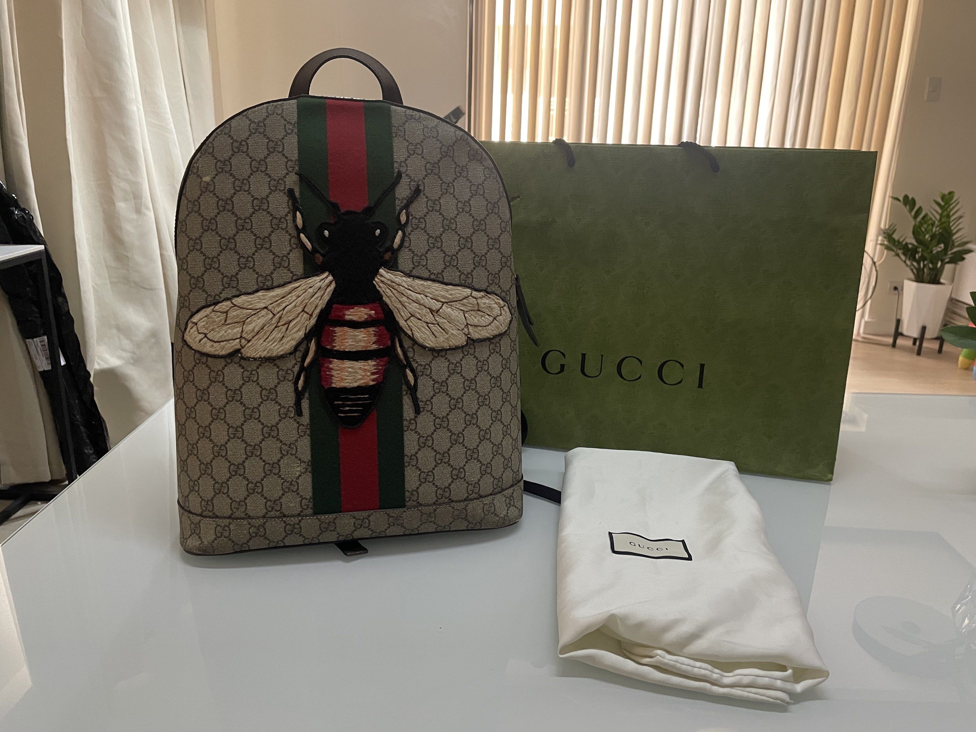 Gucci GG Supreme Monogram Animalier Bee Dome Backpack (Category: Luxury Bags & Wallets) located in Taguig. Submitted by declutteringmom314 (Listing ID 1417863767, Image 2). Description: - Authentic Gucci backpack - Iconic GG Supreme monogram - Eye-catching bee applique - Classic web stripe detail - Convenient top handle - Secure zip closure - Spacious interior - Comfortable, padded straps - Includes dust bag and Gucci shopping bag,signs of usage.