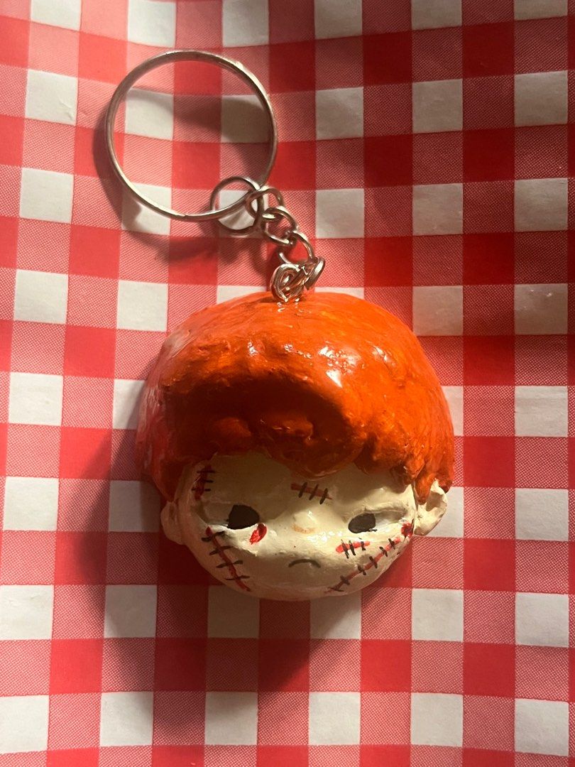 Handmade Hirono Chucky Head Keychain (Category: Handmade Craft) located in Cavite. Submitted by heyitsmork (Listing ID 1417816484, Image 1). Description: Handmade Hirono Head Keychain 🤍 Carefully crafted using air-dry clay, with details finished by hand to give each piece its own character. Lightweight yet sturdy, sealed for durability, and perfect for bags, keys, or as a display charm. MOP: GCash / Maya / BDO MOD: Lalamove / J&T 📍 Imus, Cavite