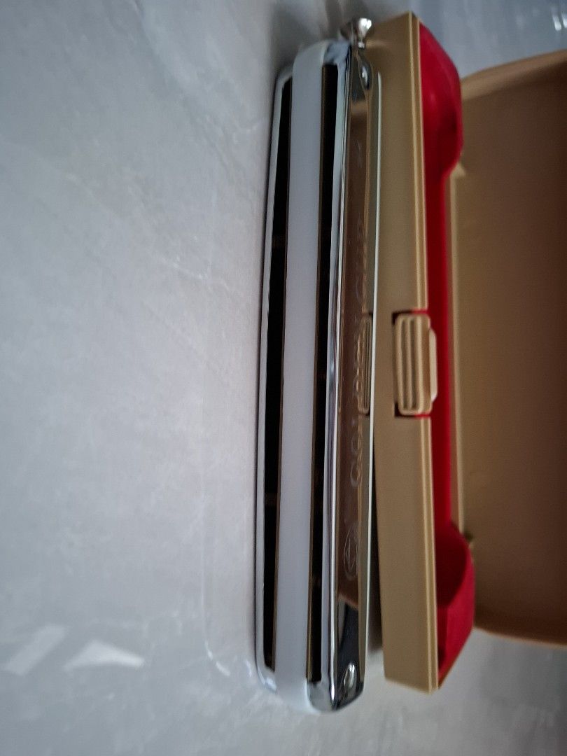 Harmonica (Category: Musical Instruments) located in Singapore. Submitted by stylelo (Listing ID 1417848588, Image 3). Description: - Golden Cup 24 Hole Harmonica - Includes original case - Well-maintained condition - Classic design ** Only used 2 times in school..