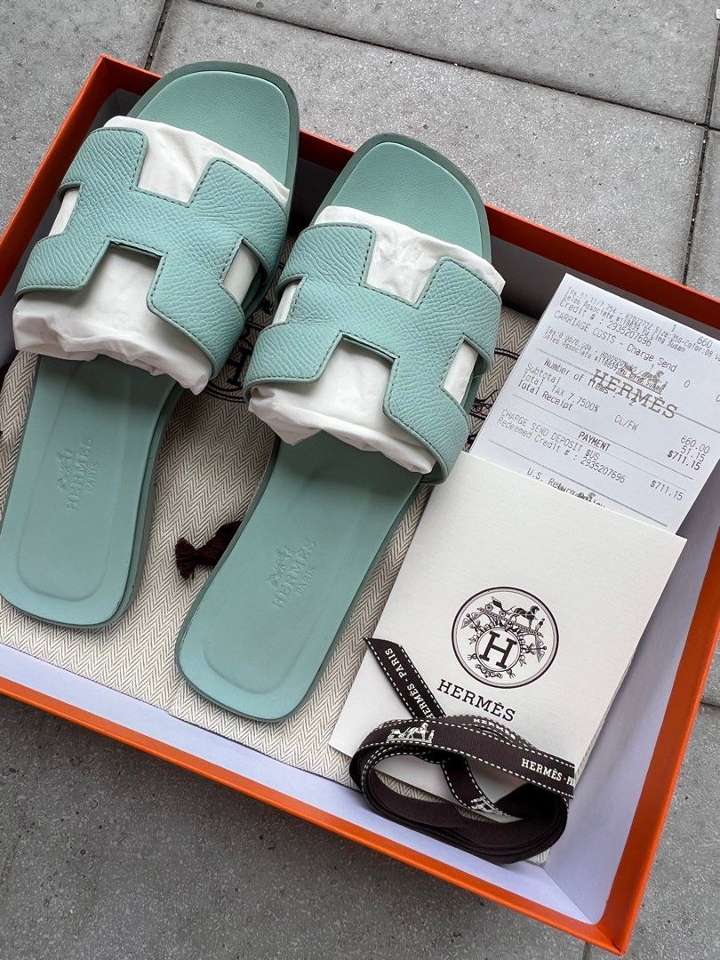 Hermes Oran (Category: Flats & Sandals) located in Quezon City. Submitted by ex-box (Listing ID 1417883230, Image 3). Description: ORIGINAL Hermes Oran Colorway: Vert Embrun (Soft pastel green ; minty) **RARE COLOR** Size: 35 COMPLETE SET!! - Box -Ribbon -Dust bags -Receipt in foldable card With sole protectors Well cleaned Well maintained Bought in Las Vegas 🇺🇸 Price 2026: $900 +tax (₱58k++).