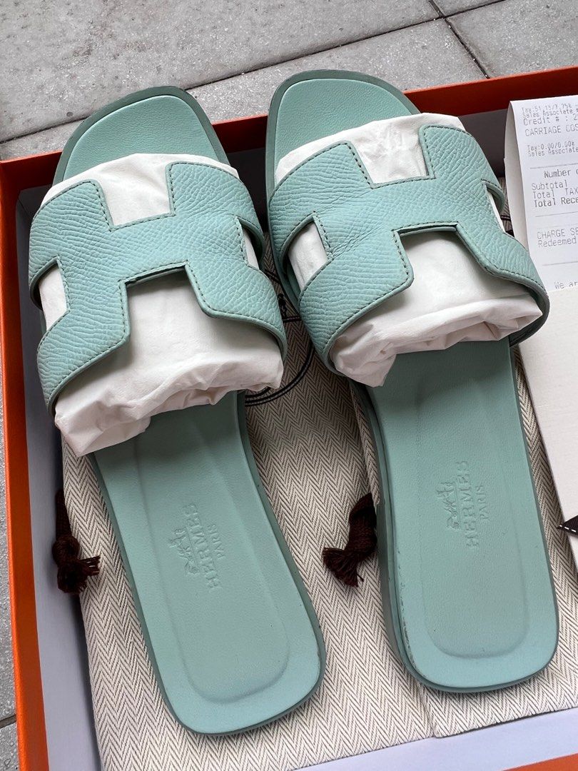Hermes Oran (Category: Flats & Sandals) located in Quezon City. Submitted by ex-box (Listing ID 1417883230, Image 2). Description: ORIGINAL Hermes Oran Colorway: Vert Embrun (Soft pastel green ; minty) **RARE COLOR** Size: 35 COMPLETE SET!! - Box -Ribbon -Dust bags -Receipt in foldable card With sole protectors Well cleaned Well maintained Bought in Las Vegas 🇺🇸 Price 2026: $900 +tax (₱58k++).