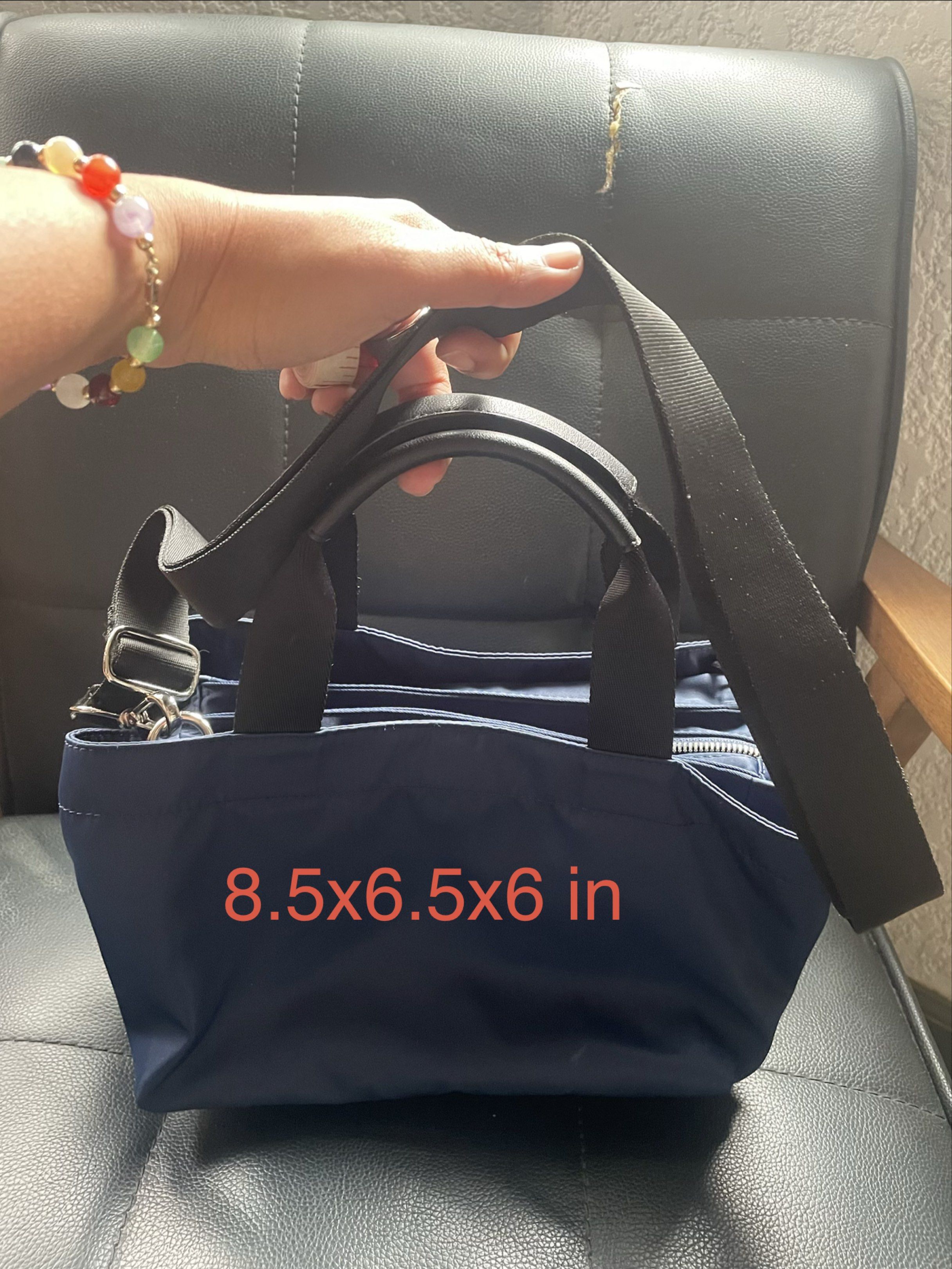 Hershe Navy Blue Handbag with Shoulder Strap (Category: Cross-body Bags) located in Cainta. Submitted by robbynt (Listing ID 1417826523, Image 1). Description: 👗👟👜 Part of my closet clean-out! Letting go of some of my faves — all preloved and in great shape. From my closet to yours. 😊 ✅ Color - navy blue ✅ Size - small ✅ Bag type - 2 way: handbag & sling ✅ Bag closure - zipper & magnetic lock ✅ Hardware - silver ✅ Adjustable removable strap ✅