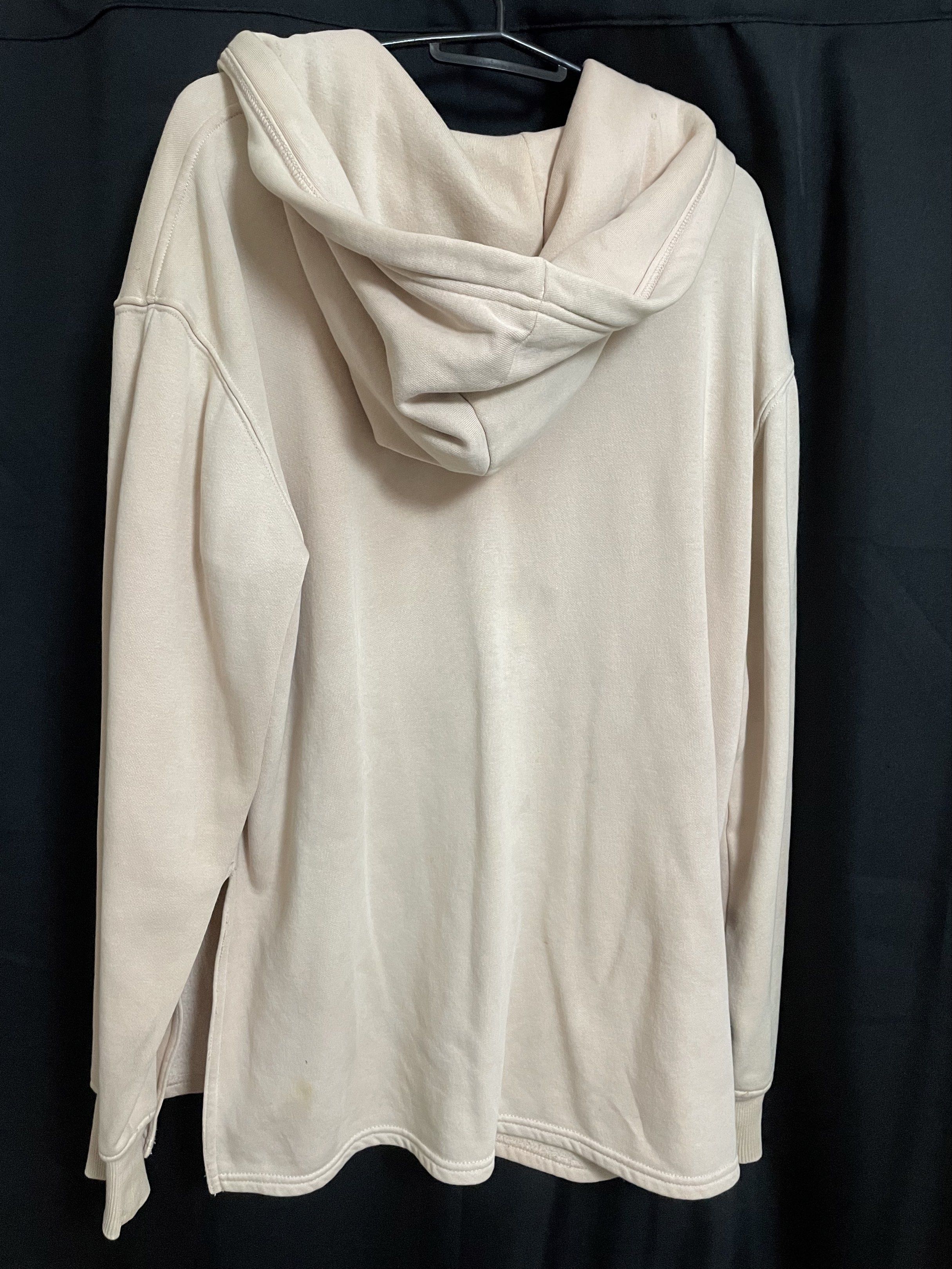 H&M Zip-Up Hoodie - Size S (Category: Hoodies) located in Manila. Submitted by kyletrvs (Listing ID 1417888279, Image 2). Description: H&M Jacket zip-up hoodie is a size S. It features a full zip closure, a hood, and long sleeves. The hoodie has a light beige color. There are some visible stains on the front. In need for wash.
