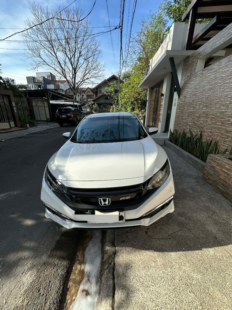 Honda Civic 1.8 VTI E CVT MMC MODULO Auto (Category: Used Cars) located in Manila. Submitted by dcmobility (Listing ID 1417885951, Image 1). Description: 2016 Honda Civic 1.8 E CVT Modulo Edition A1 Condition | Casa-Maintained | Cash Only 📍 Eastwood, QC Details: 1st owner, 116,669 km Original Modulo body kit & 18" mags Brand new tires Complete PMS records Always garaged No accident/flood/repaint Inclusions: Comprehensive insurance (transferable)