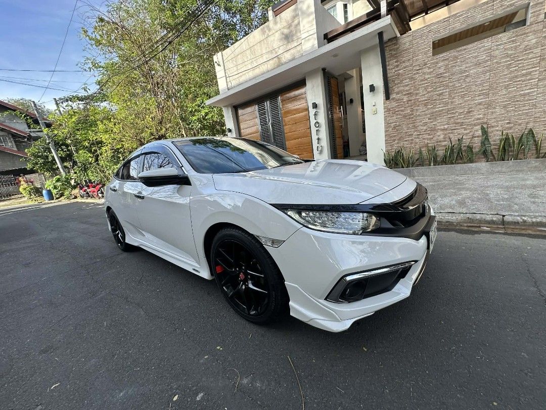 Honda Civic 1.8 VTI E CVT MMC MODULO Auto (Category: Used Cars) located in Manila. Submitted by dcmobility (Listing ID 1417885951, Image 2). Description: 2016 Honda Civic 1.8 E CVT Modulo Edition A1 Condition | Casa-Maintained | Cash Only 📍 Eastwood, QC Details: 1st owner, 116,669 km Original Modulo body kit & 18" mags Brand new tires Complete PMS records Always garaged No accident/flood/repaint Inclusions: Comprehensive insurance (transferable)