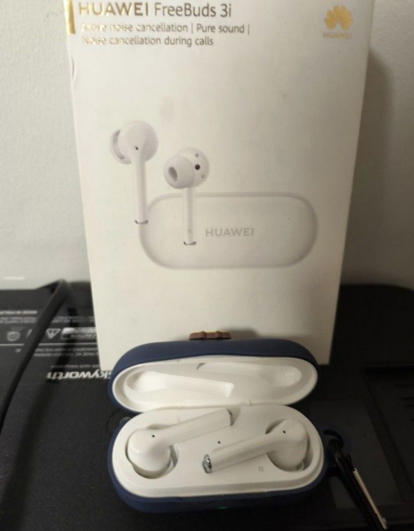 Huawei FreeBuds 3i - Active Noise Cancellation (Category: Earphones) located in Caloocan City. Submitted by _preloved_bb (Listing ID 1417968894, Image 2). Description: - Huawei FreeBuds 3i earphones - Active noise cancellation - Pure sound quality - White color - Includes charging case - Comes with a cute blue protective case - Noise cancellation available during calls.