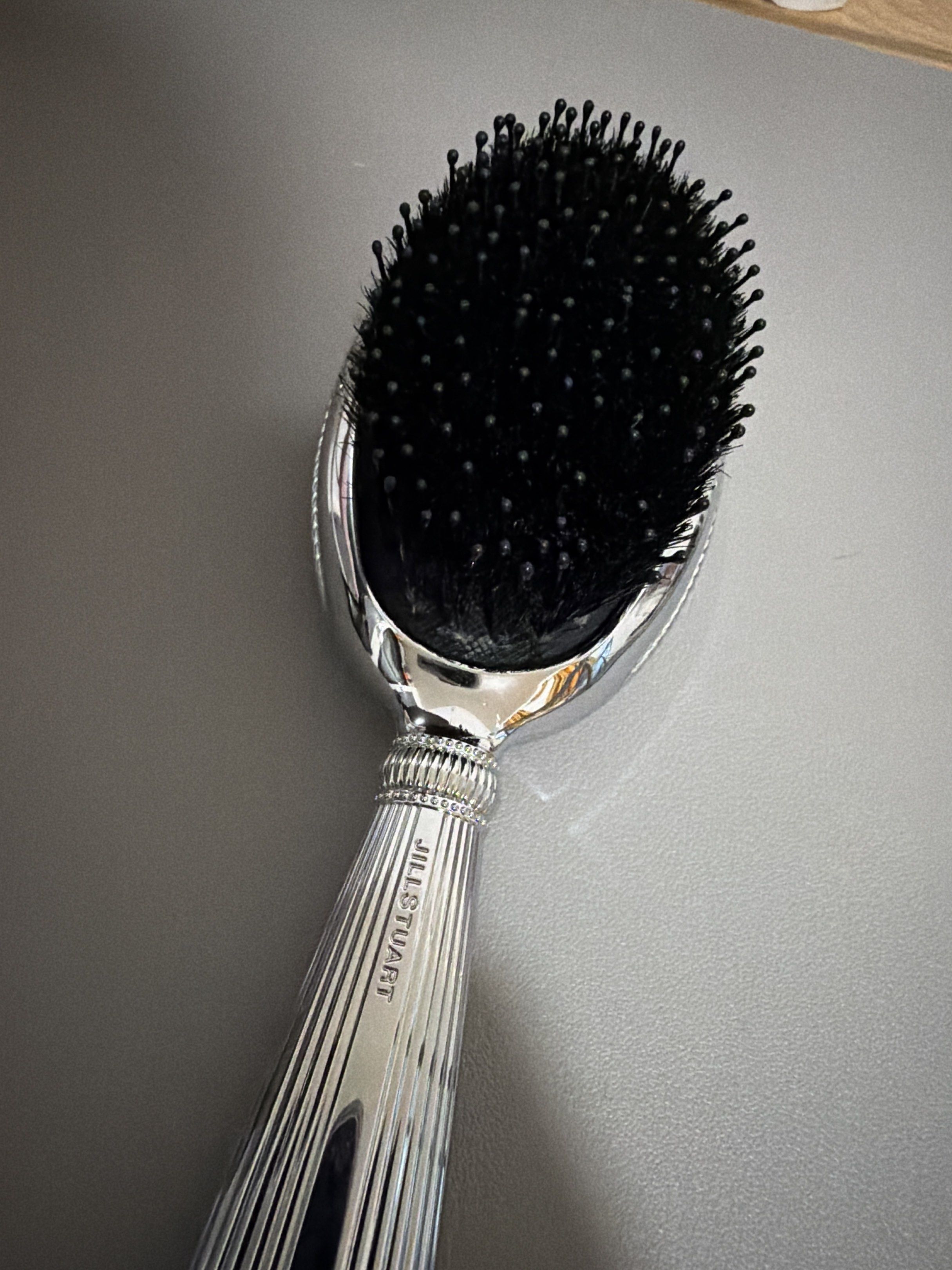 Jill Stuart Hair Brush (Category: Hair) located in Cainta. Submitted by preloveddeclutterr (Listing ID 1417887890, Image 3). Description: REGENCY ERA INSPIRED HAIR BRUSH - AUTHENTIC Jill Stuart hair brush - Silver-toned handle with vertical ridges - Engraved brand name - Black bristles - Decorative design on the back - Stylish hair care accessory Starting price online starts at ₱2,400+.
