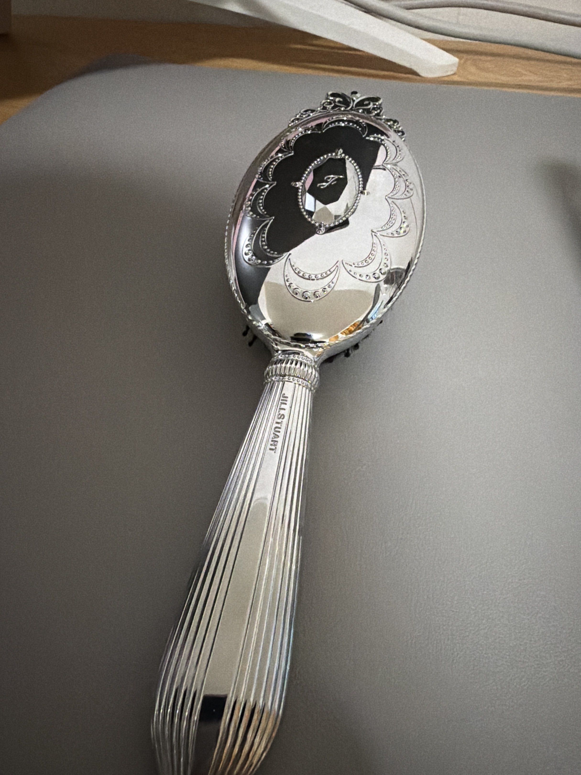 Jill Stuart Hair Brush (Category: Hair) located in Cainta. Submitted by preloveddeclutterr (Listing ID 1417887890, Image 2). Description: REGENCY ERA INSPIRED HAIR BRUSH - AUTHENTIC Jill Stuart hair brush - Silver-toned handle with vertical ridges - Engraved brand name - Black bristles - Decorative design on the back - Stylish hair care accessory Starting price online starts at ₱2,400+.