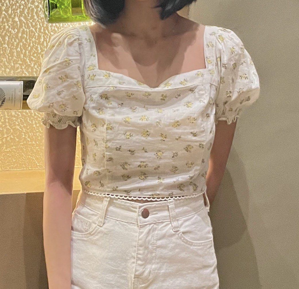 Just G Floral Crop Top XS (Category: Sleeveless) located in Manila. Submitted by helzn (Listing ID 1417852255, Image 2). Description: - Brand: Just G, worn only once - Style: Floral crop top - Features: Square neckline, puff sleeves, scalloped hem, tie-up back - Color: Cream with yellow floral print - Size: XS.