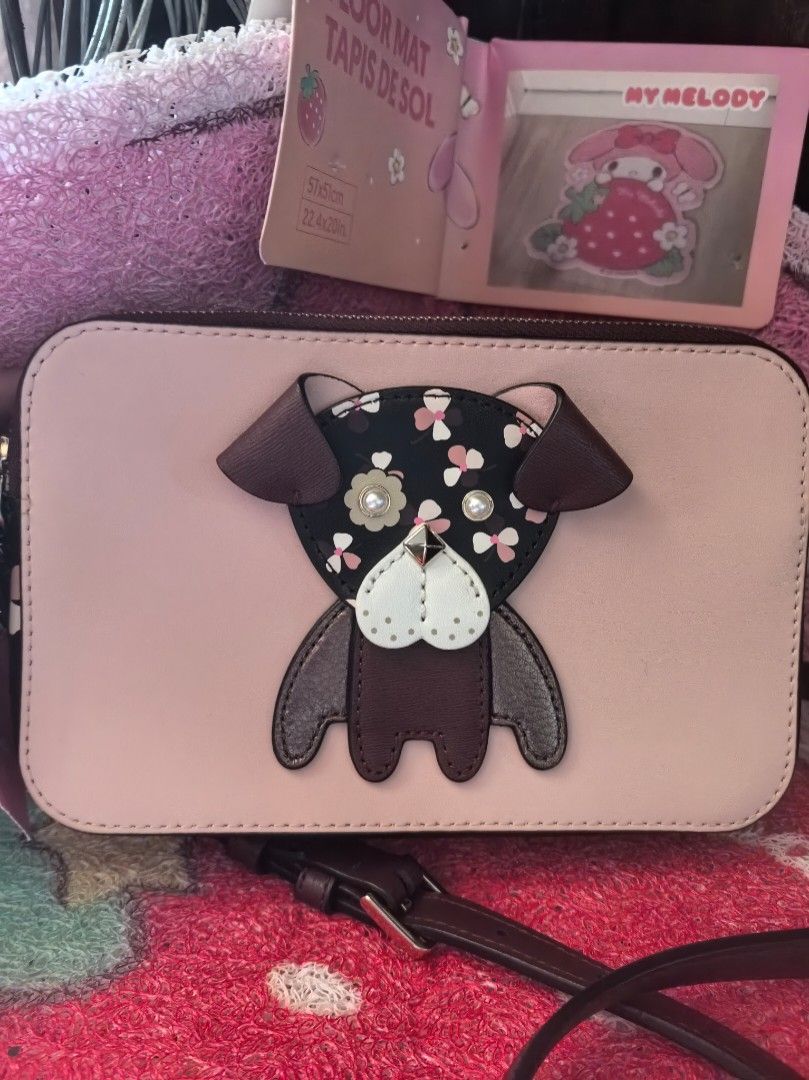 Kate Spade Dog carrier sling bag (Category: Sling Bags) located in Quezon City. Submitted by uptrendglam (Listing ID 1417865191, Image 2). Description: Kate Spade sling bag, with 2 zipper and one open compartment, fits iphone with card holder and floral design on sides. Please be considerate in making your offer and refrain from offering a discount of 70 up to 80% off. This is a limited edition bag..
