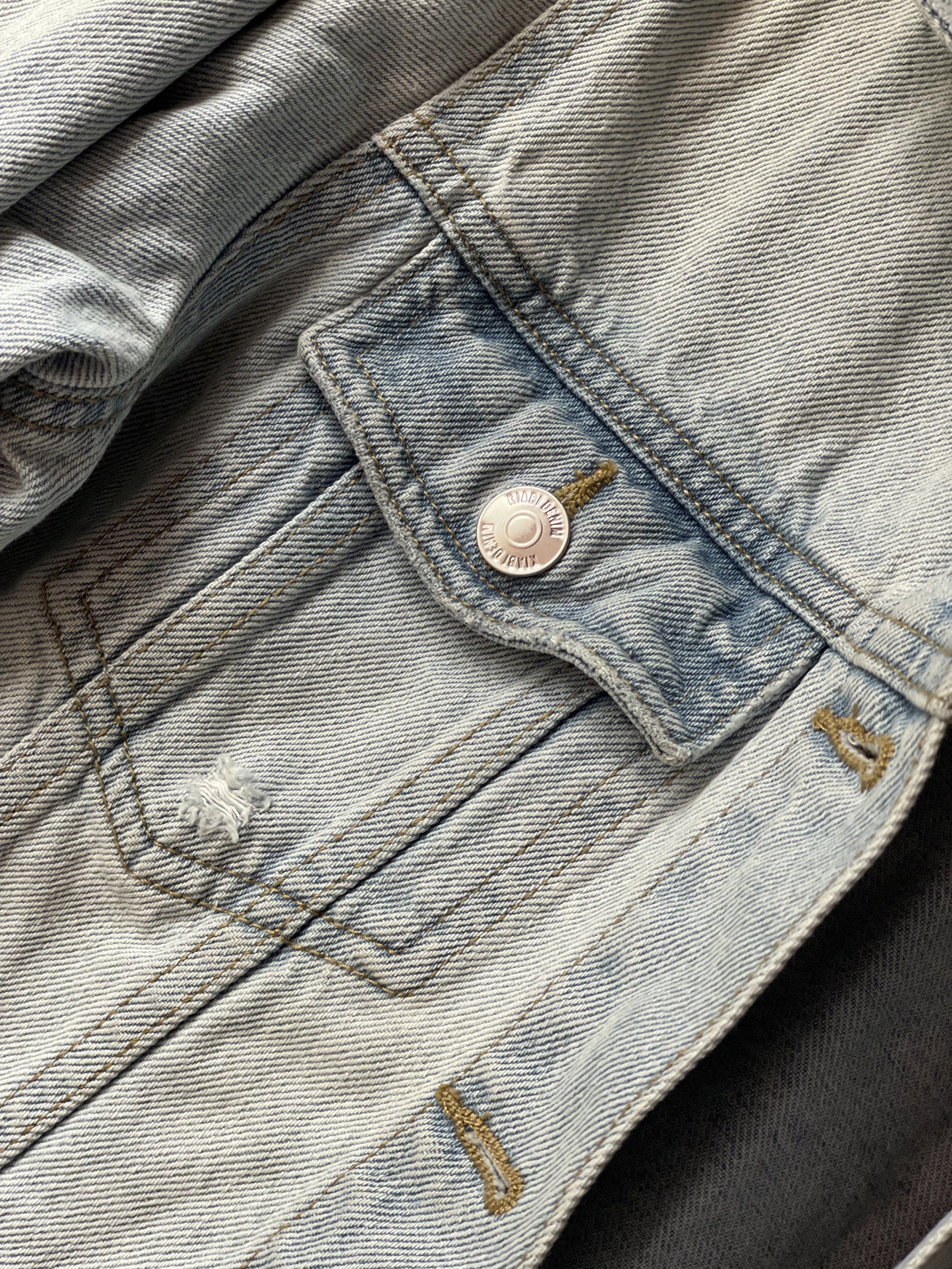 Kiabi Eco Collection Denim Jacket - XS (Category: Coats, Jackets and Outerwear) located in Manila. Submitted by chenpots (Listing ID 1417820363, Image 3). Description: Light wash denim jacket from Kiabi's Eco Collection. Features a classic design with button closures, chest pockets, and side pockets. The jacket is size XS. Perfect for layering or wearing on its own. A versatile piece for any wardrobe. Bagong bago pa po. Halos hindi nagamit, nasto