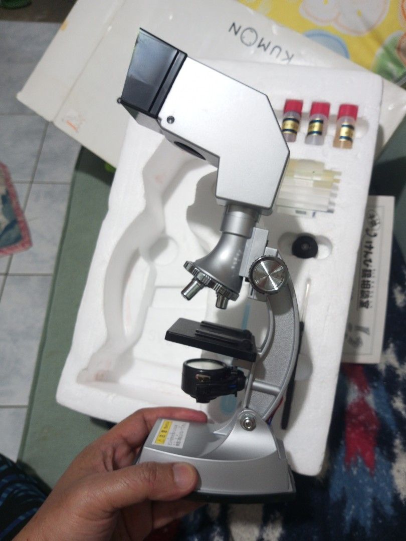 Kumon 4 Way Microscope (Category: Medical Supplies & Tools) located in Cabuyao City. Submitted by treblig23 (Listing ID 1417893796, Image 2). Description: - Kumon 4 Way Scope microscope - Complete set with accessories (slides, vials, manual, etc...) - Ready to use - Silver finish - Designed for educational purposes - Features a 4-way scope (Microscope, Wall Projection, Vertical Projection and Magnification.) - Includes original packaging Cabuyao/