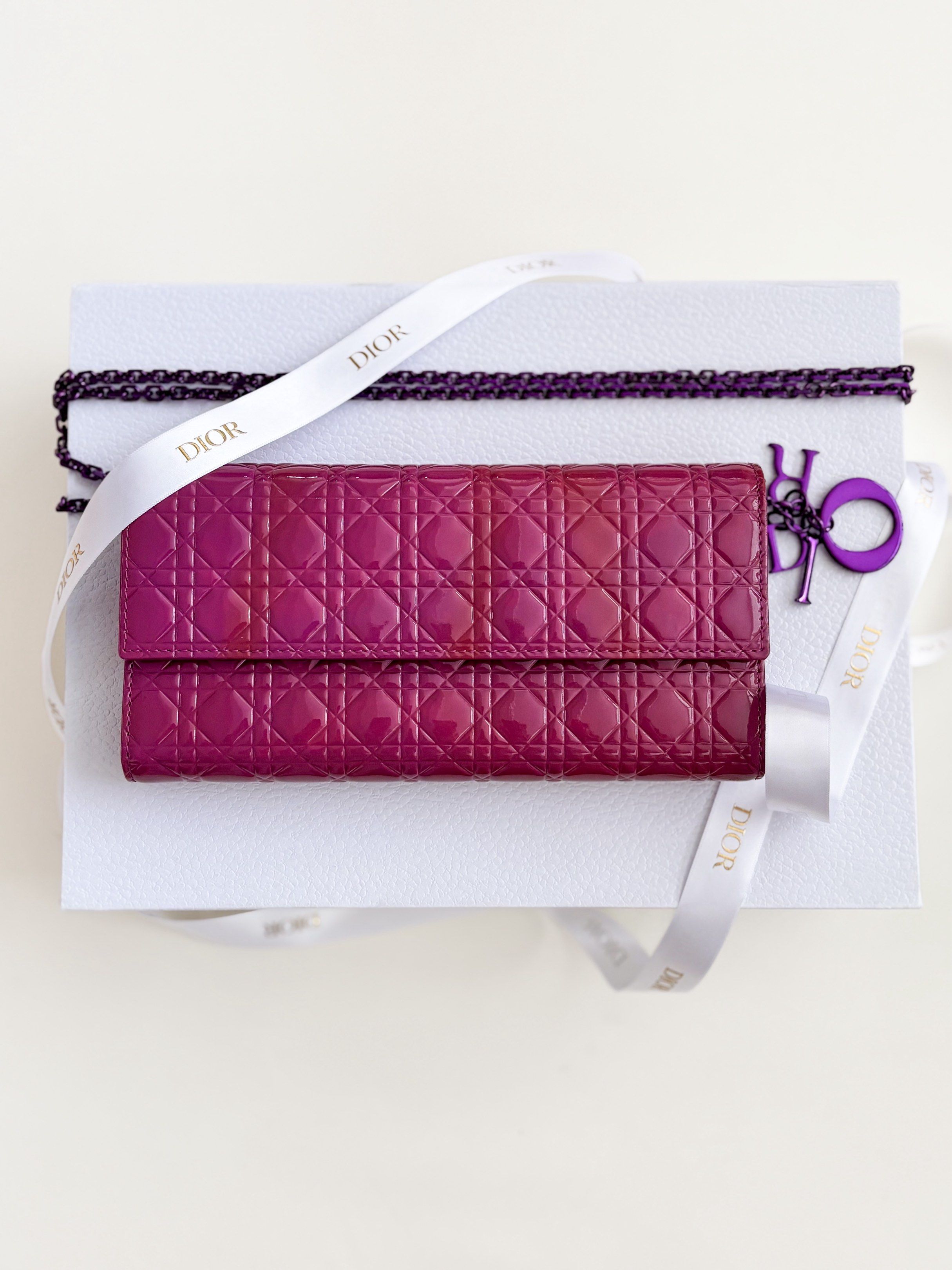 Lady Dior WOC Wallet on Chain (Category: Luxury Bags & Wallets) located in Muntinlupa City. Submitted by closet.confessions (Listing ID 1417856842, Image 1). Description: Unused condition Has a little, unnoticeable discoloration due to storage. (Truly unnoticeable in person) Comes full set with box, dustbag, removable chain & dior pendant Can fit iphone pro max SRP is 147k plus taxes!! 🤯 What a steal! .