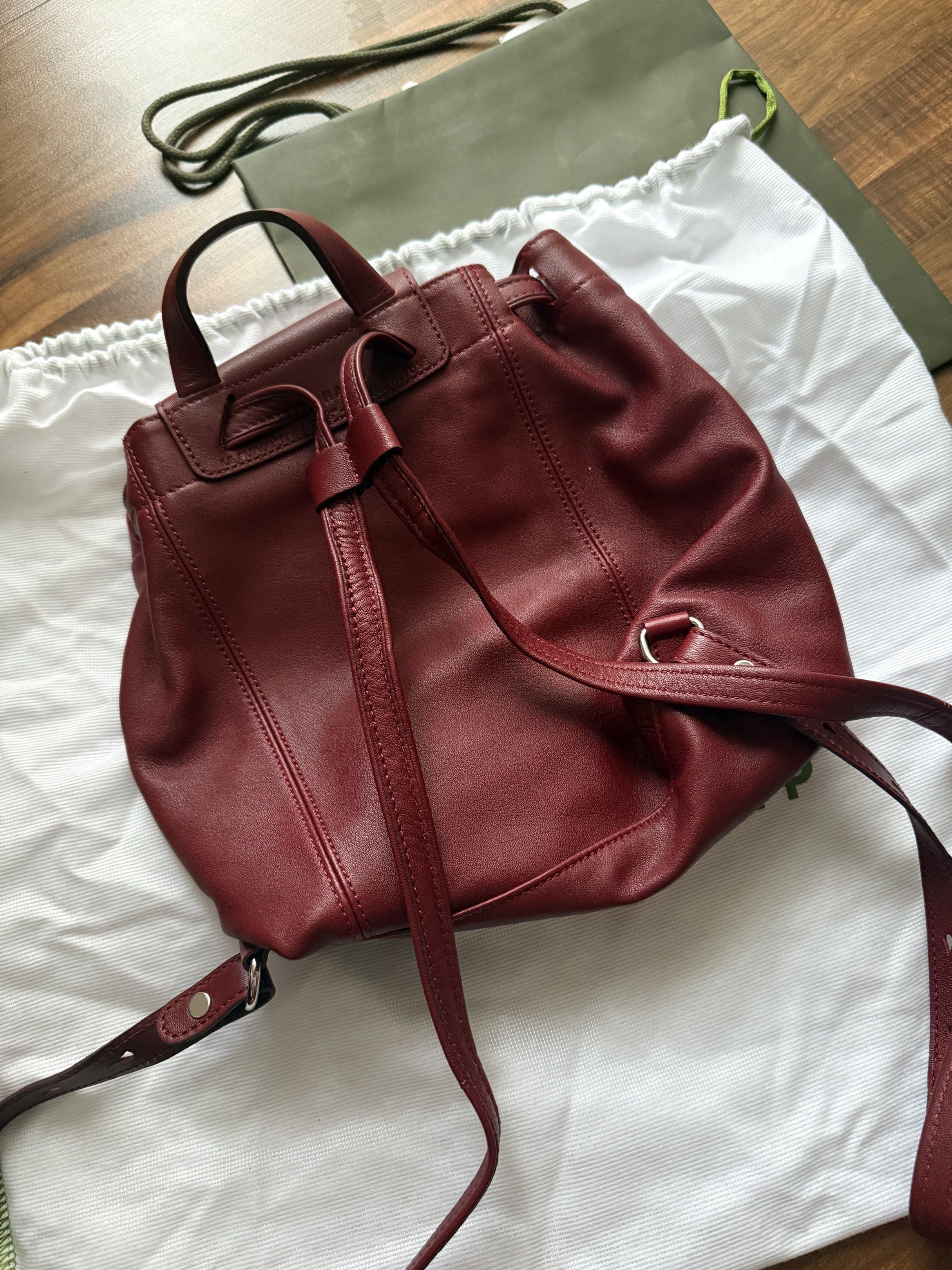 Longchamp Le Pliage leather backpack (Category: Luxury Bags & Wallets) located in Mandaluyong City. Submitted by triciaaaas (Listing ID 1417831444, Image 2). Description: Model / Style: Le Pliage Leather Backpack Color: Burgundy Material: Premium soft leather with durable nylon accents (signature Longchamp quality) Features: • Elegant & timeless design — classic Longchamp look • High-quality leather construction — soft yet durable • Spacious inte