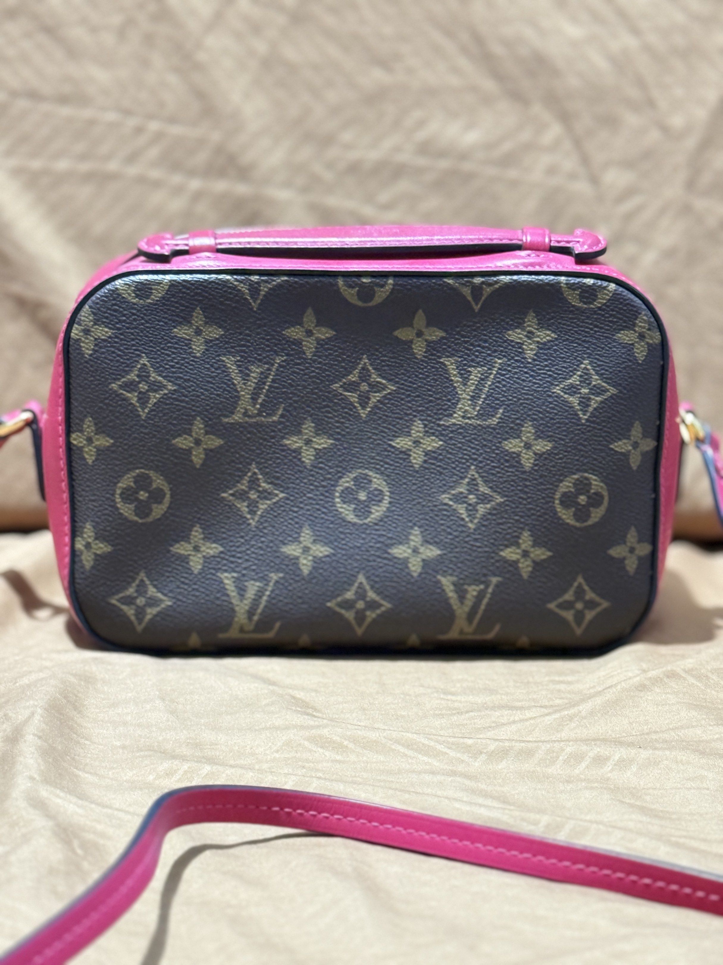 Louis Vuitton Monogram Crossbody Bag (Category: Luxury Bags & Wallets) located in Davao. Submitted by marmalade21 (Listing ID 1417839732, Image 3). Description: - Authentic Louis Vuitton crossbody bag - Iconic monogram pattern - Eye-catching pink trim and strap - Gold-tone zipper and hardware - Interior slip pocket - Includes dust bag - Made in Spain.