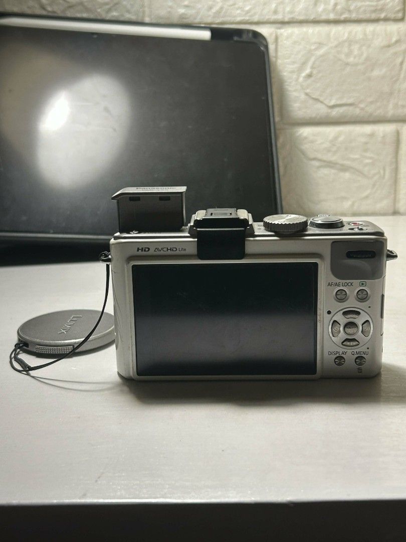 Lumix LX5 (Category: Cameras) located in Marikina City. Submitted by edzmie (Listing ID 1417946000, Image 2). Description: Lumix LX5 Inclusions: - Camera - Original battery Condition / Notes: - No functional issues - May small dead pixel sa LCD lang and hindi affected ang image output - Fully usable pa rin and LCD replacement lang needed if you're maselan - With pop-up flash - Good battery life (used it sa malaysia and it was great) Performance: 