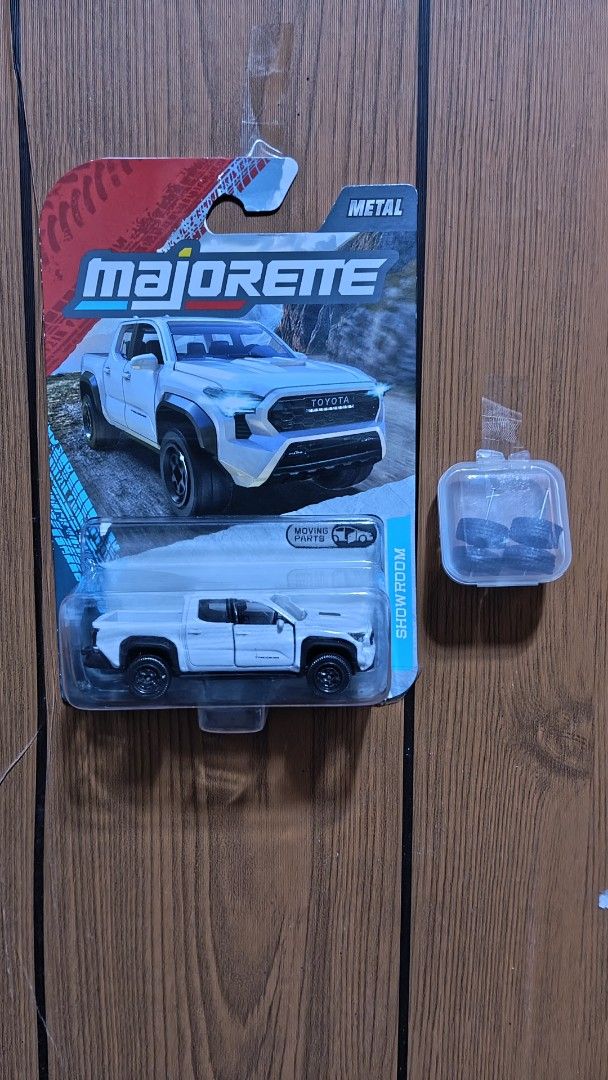 Majorette Toyota Tacoma (Category: Vehicle & Diecast Models) located in Quezon City. Submitted by rex.spamzx (Listing ID 1417952610, Image 1). Description: - Majorette Toyota Tacoma toy car - Color: White - free Black wheels - use once - Made of metal rfs: tinamad icustomize, kinalas ko nayan para palitan ng gulong pero binalik ko lang din sa stock wheels good as new pa.