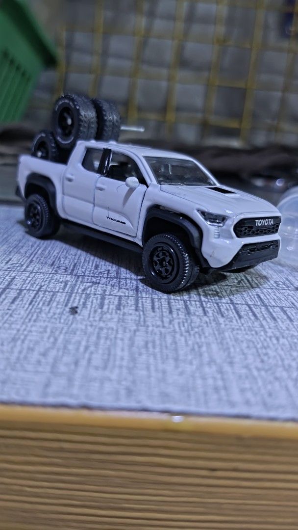 Majorette Toyota Tacoma (Category: Vehicle & Diecast Models) located in Quezon City. Submitted by rex.spamzx (Listing ID 1417952610, Image 2). Description: - Majorette Toyota Tacoma toy car - Color: White - free Black wheels - use once - Made of metal rfs: tinamad icustomize, kinalas ko nayan para palitan ng gulong pero binalik ko lang din sa stock wheels good as new pa.
