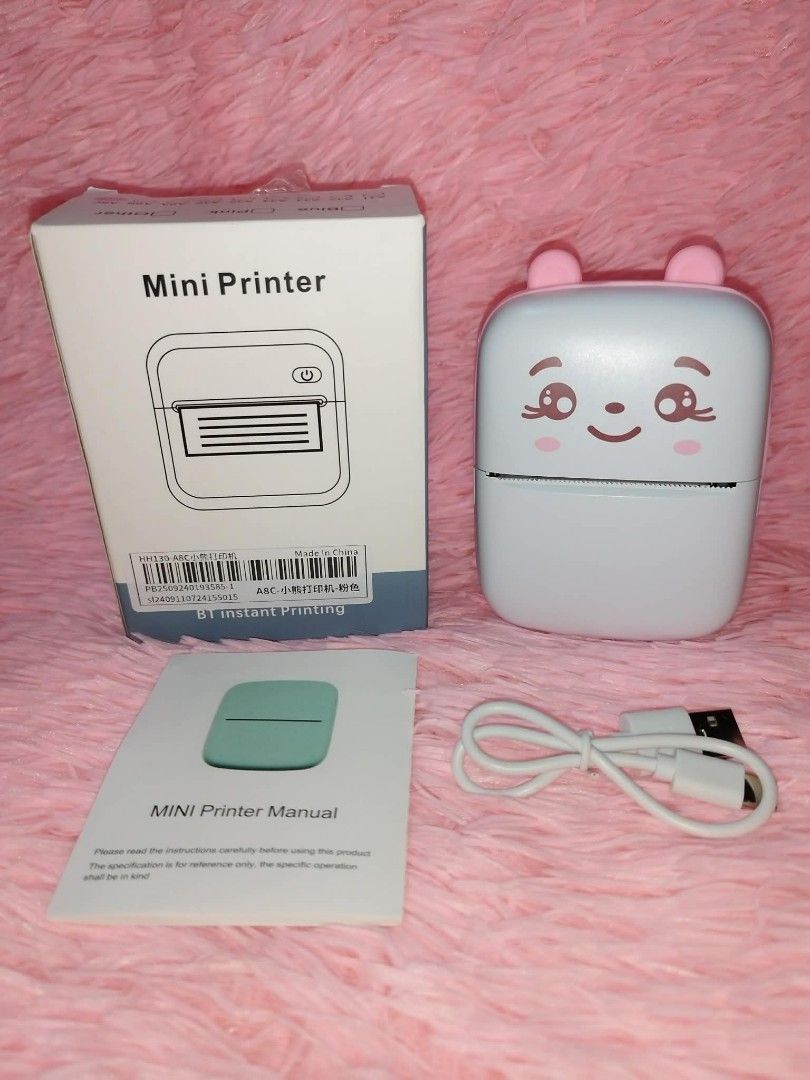 Mini printer (Category: Other Home Appliances) located in Manila. Submitted by kaidenponce (Listing ID 1418010545, Image 1). Description: mini printer with thermal paper inside.