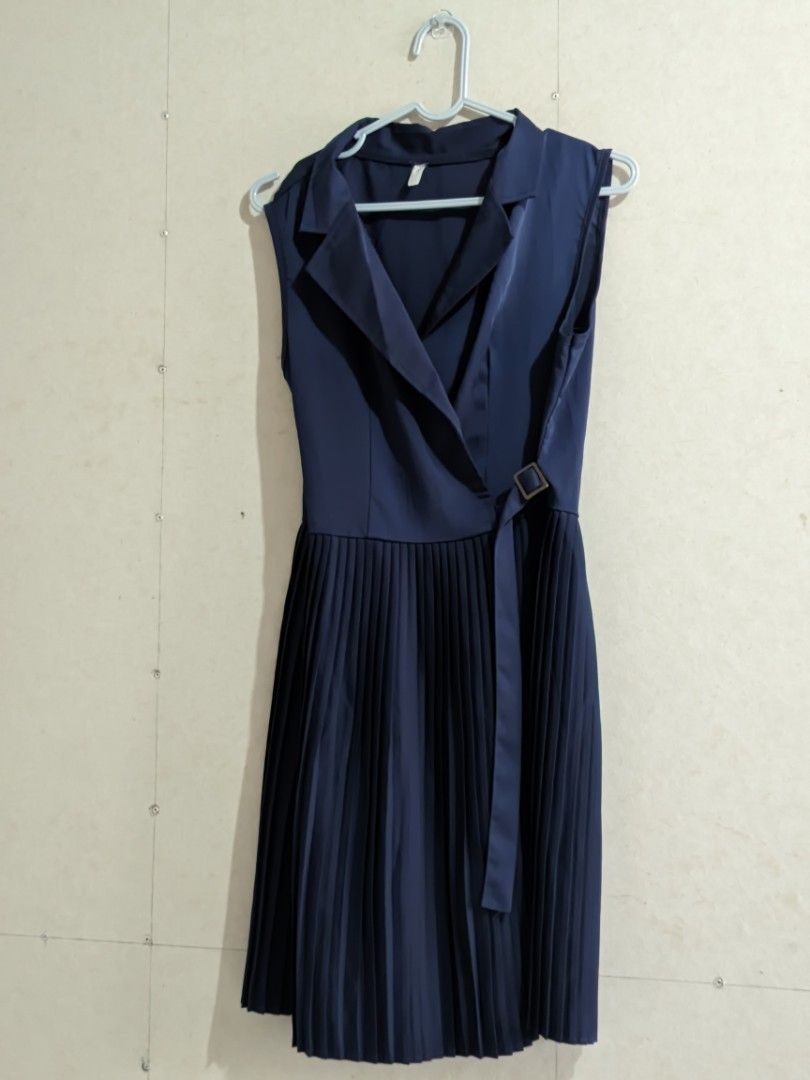 Navy Blue Pleated Dress (Category: Dresses) located in Manila. Submitted by elixiriaz (Listing ID 1417856169, Image 1). Description: - Navy blue dress - Pleated skirt - Collared neckline - Belt with buckle - Sleeveless - Tie-inside for extra security - Perfect for formal events.
