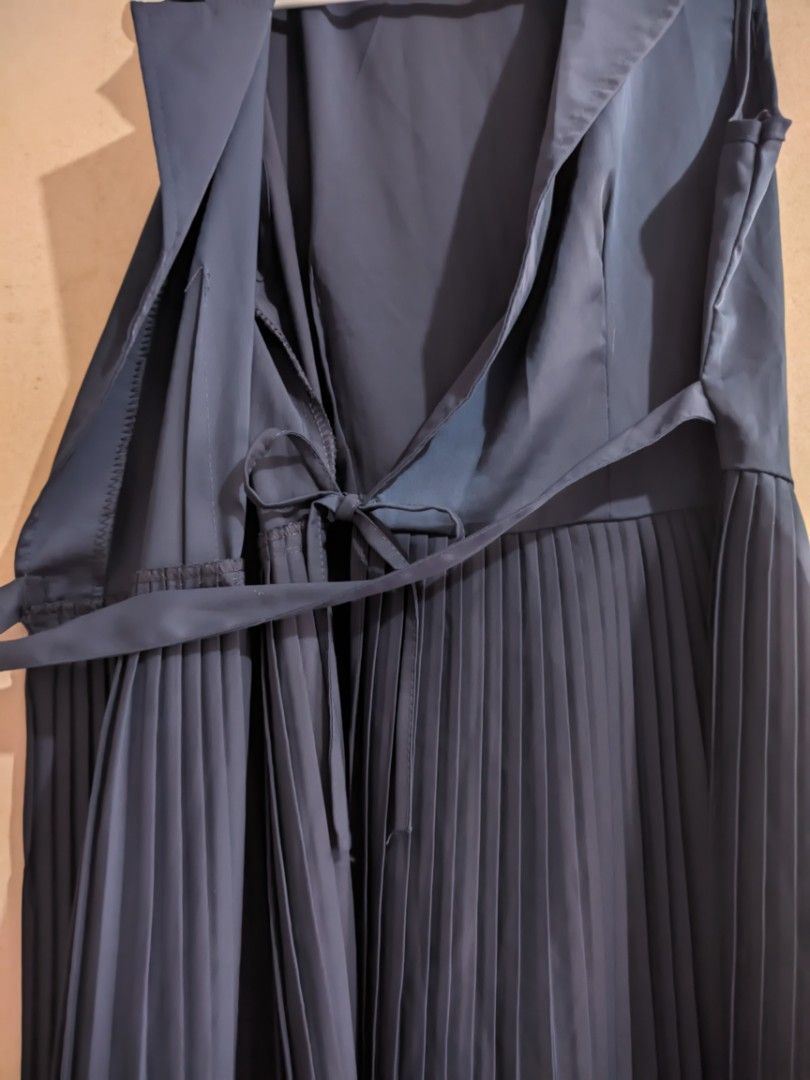 Navy Blue Pleated Dress (Category: Dresses) located in Manila. Submitted by elixiriaz (Listing ID 1417856169, Image 3). Description: - Navy blue dress - Pleated skirt - Collared neckline - Belt with buckle - Sleeveless - Tie-inside for extra security - Perfect for formal events.