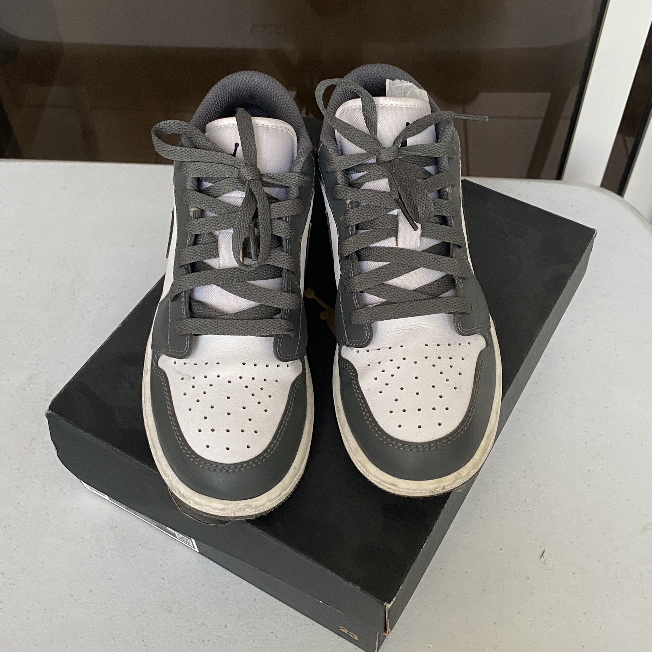 nike air jordan 1 low sneakers (Category: Sneakers) located in Quezon City. Submitted by abimalaga (Listing ID 1417898385, Image 2). Description: - last price, i can just keep if no one will purchase or i-llowball lang po - originally selling for 4,500; bought in store for around 7,500 - Authentic Nike Air Jordan 1 Low - Color: Grey/White - Size: 38 EUR (24 cm) - Condition: Rarely used, minimal dirt and creases - Includes: box and stuffing paper 