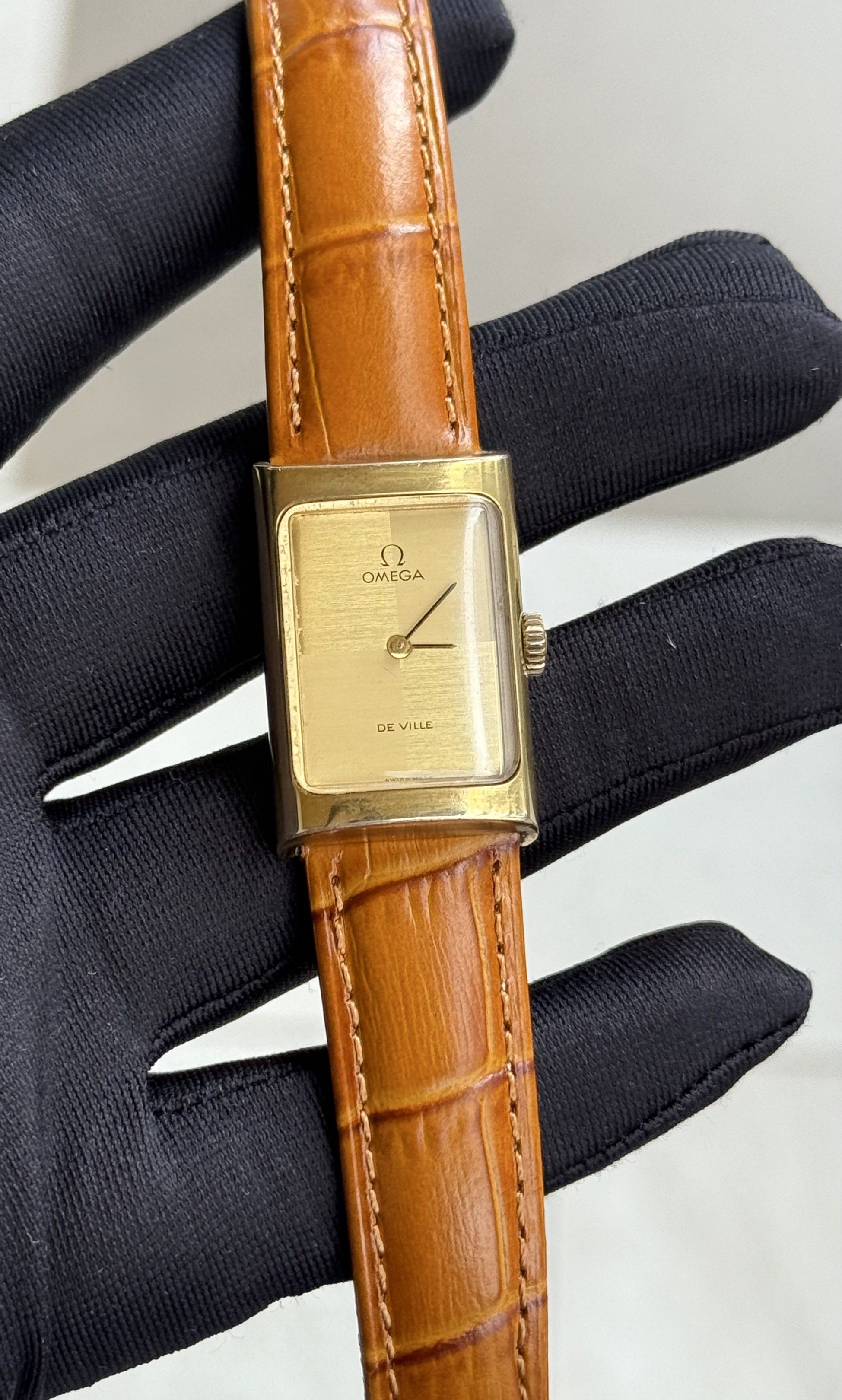 Omega De Ville Tank (Category: Luxury Watches) located in Quezon City. Submitted by mjgorobat15 (Listing ID 1417832359, Image 3). Description: Omega De Ville Tank •Reference no. 511.0458 •Year 1973 •Movement: Manual Wind Caliber 1070 •Case: Gold plated •Case size: 20mm x 29mm •Gold checkered dial •Service History: January 2026 •Bracelet: New AM genuine leather •Inclusions: Watch and omega presentation box only •Condition: 9/10.