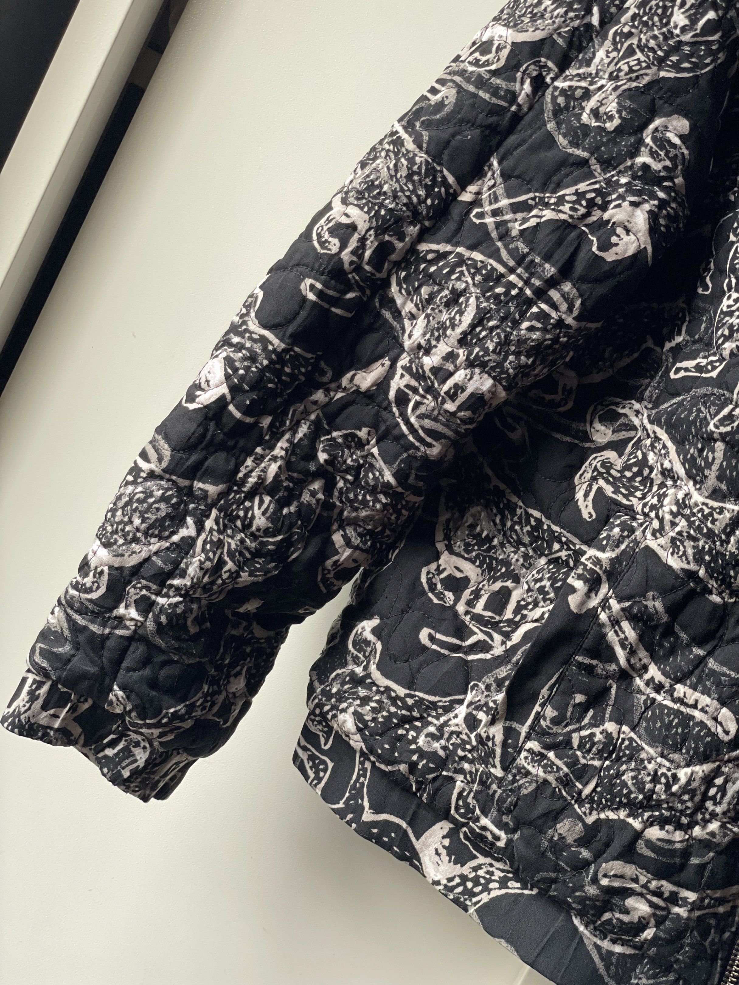 Quilted Black and White Tiger Jacket (Category: Coats, Jackets and Outerwear) located in Manila. Submitted by chenpots (Listing ID 1417896627, Image 2). Description: Stylish quilted jacket featuring a unique black and white animal print. It has a full zipper closure and a round neckline. The jacket has long sleeves and a comfortable fit. Perfect for adding a touch of flair to any outfit. A versatile piece that can be dressed up or down..