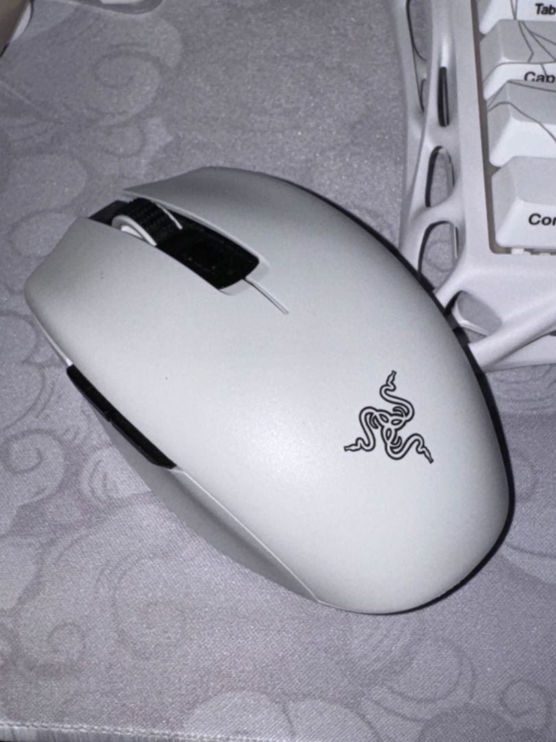 Razer Orochi V2 Wireless Gaming Mouse White (Category: Mouse & Mousepads) located in San Pedro. Submitted by christinejjj (Listing ID 1417854451, Image 3). Description: - RFS: Need funds. Gonna buy a ticket to HK. Since I'm selling all of my PC stuff, I might as well sell this one too. - No issues. Perfect for white setup..