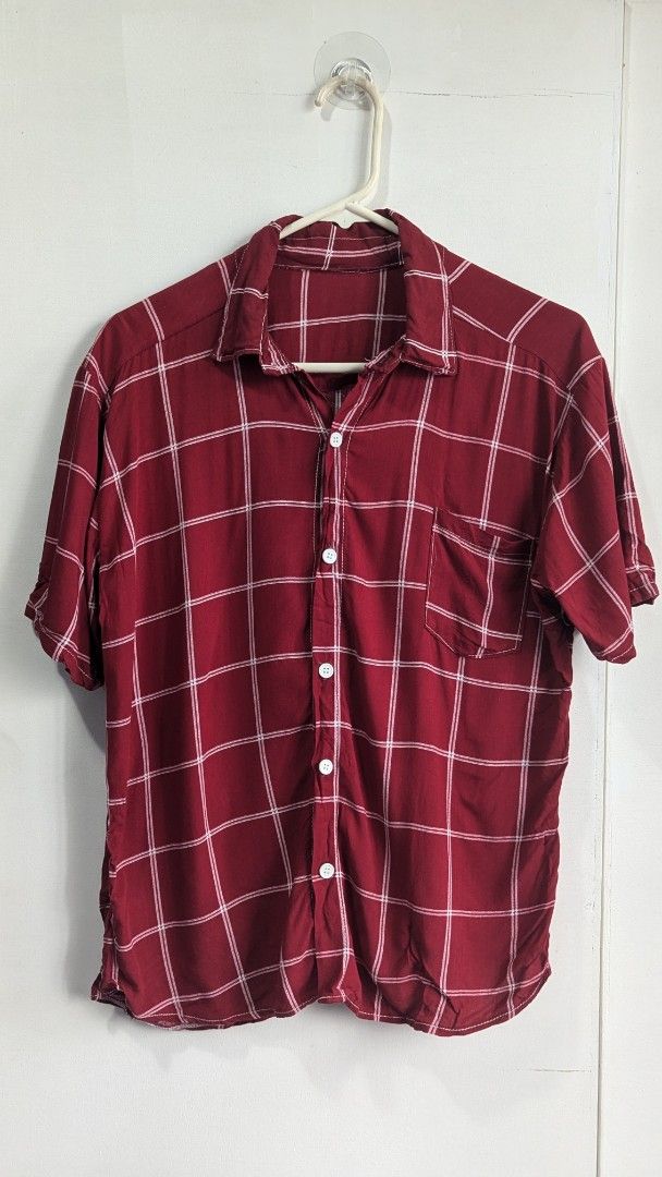 Red Plaid Short Sleeve Shirt (Category: Shirts) located in Marikina City. Submitted by mlektea (Listing ID 1417861044, Image 1). Description: - Classic red and white plaid pattern - Short-sleeved - Collared neckline - Single chest pocket - Button-down front - Lightweight fabric - Versatile style - Fits S-L frame. I am Medium frame and I wore this oversized .