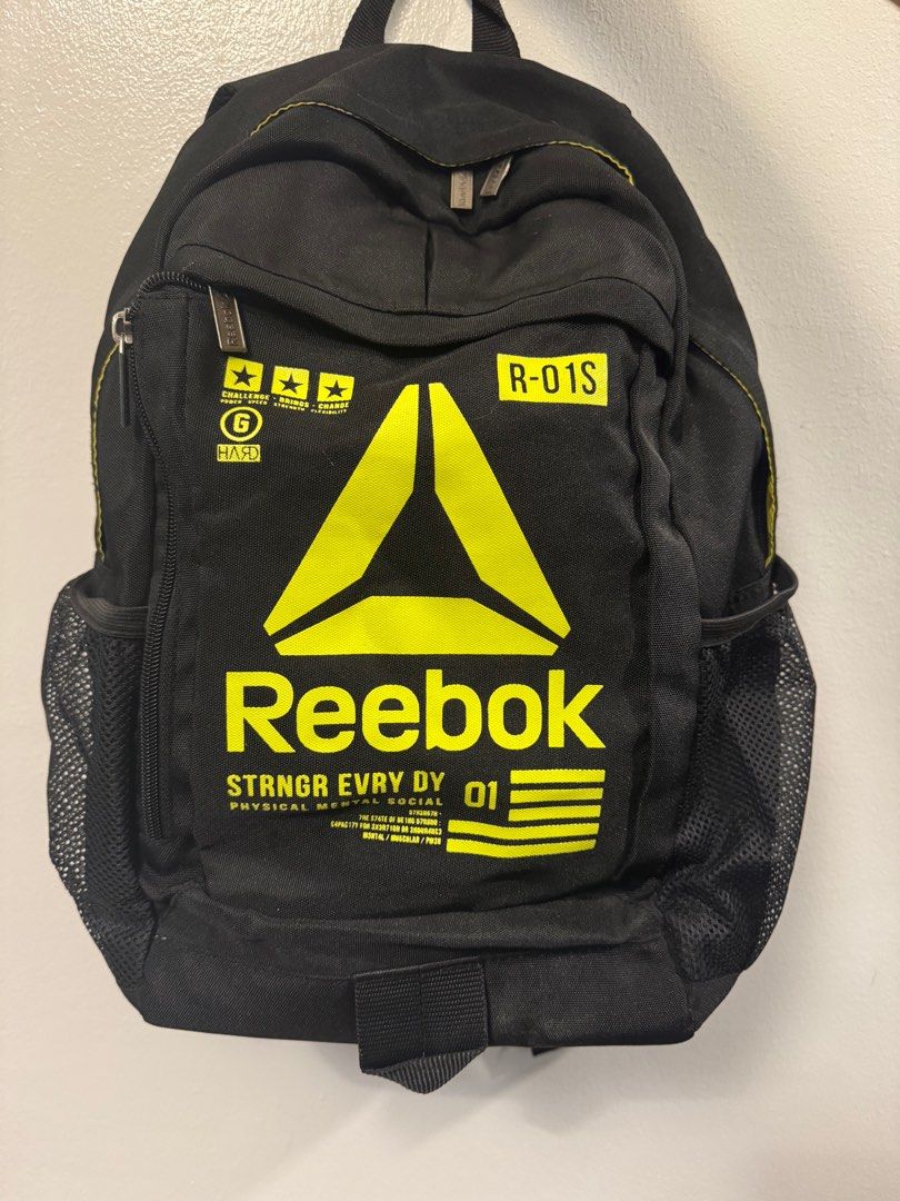 Reebok Black Backpack (Category: Backpacks) located in Quezon City. Submitted by smt00 (Listing ID 1417840500, Image 1). Description: - Side mesh pockets - Front zippered pocket - Yellow interior lining - Additional interior pockets .